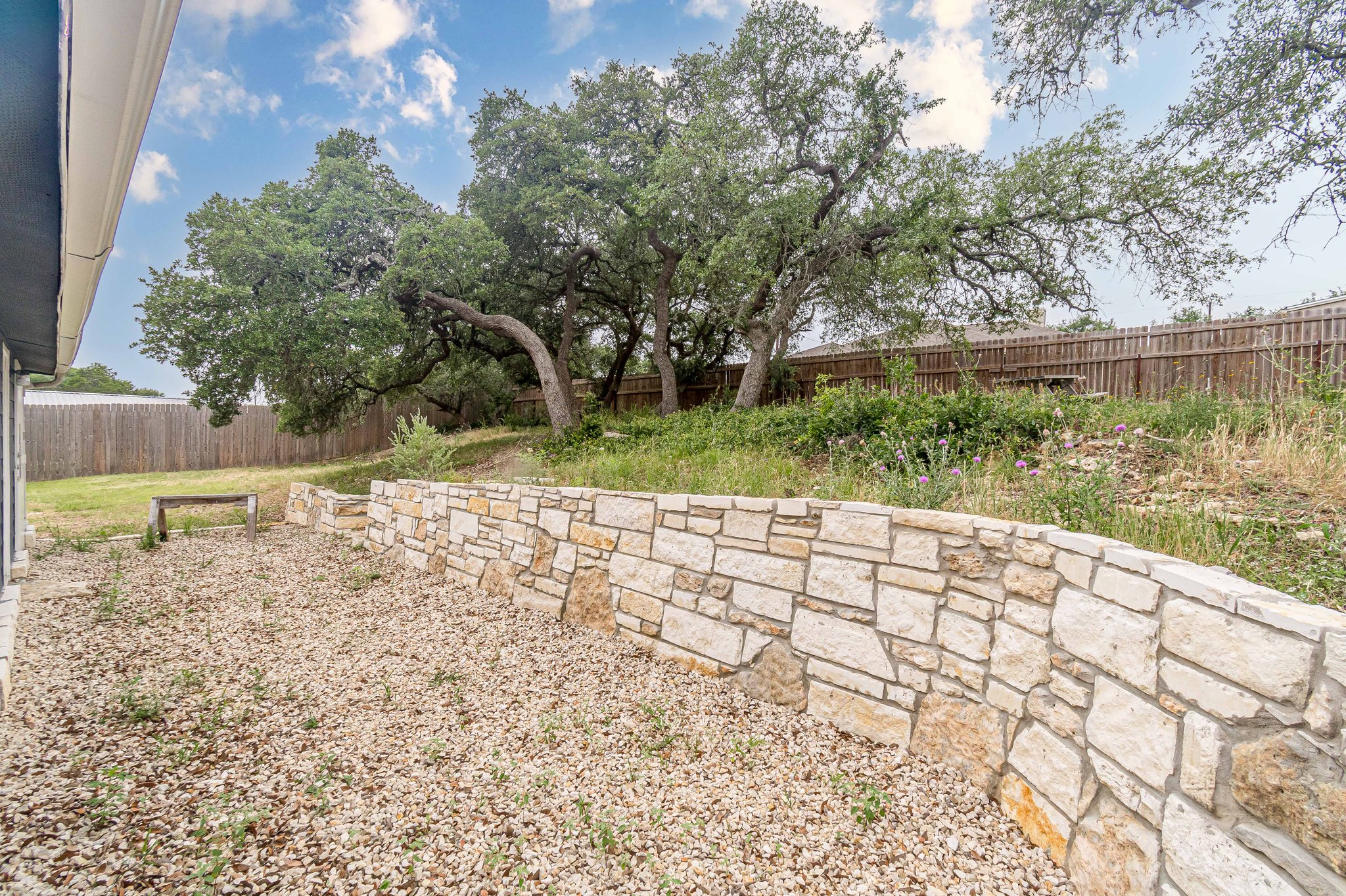 560 Persimmon Pass Fischer, TX 78623 - Photo 24 of 26 a view of a backyard of the house