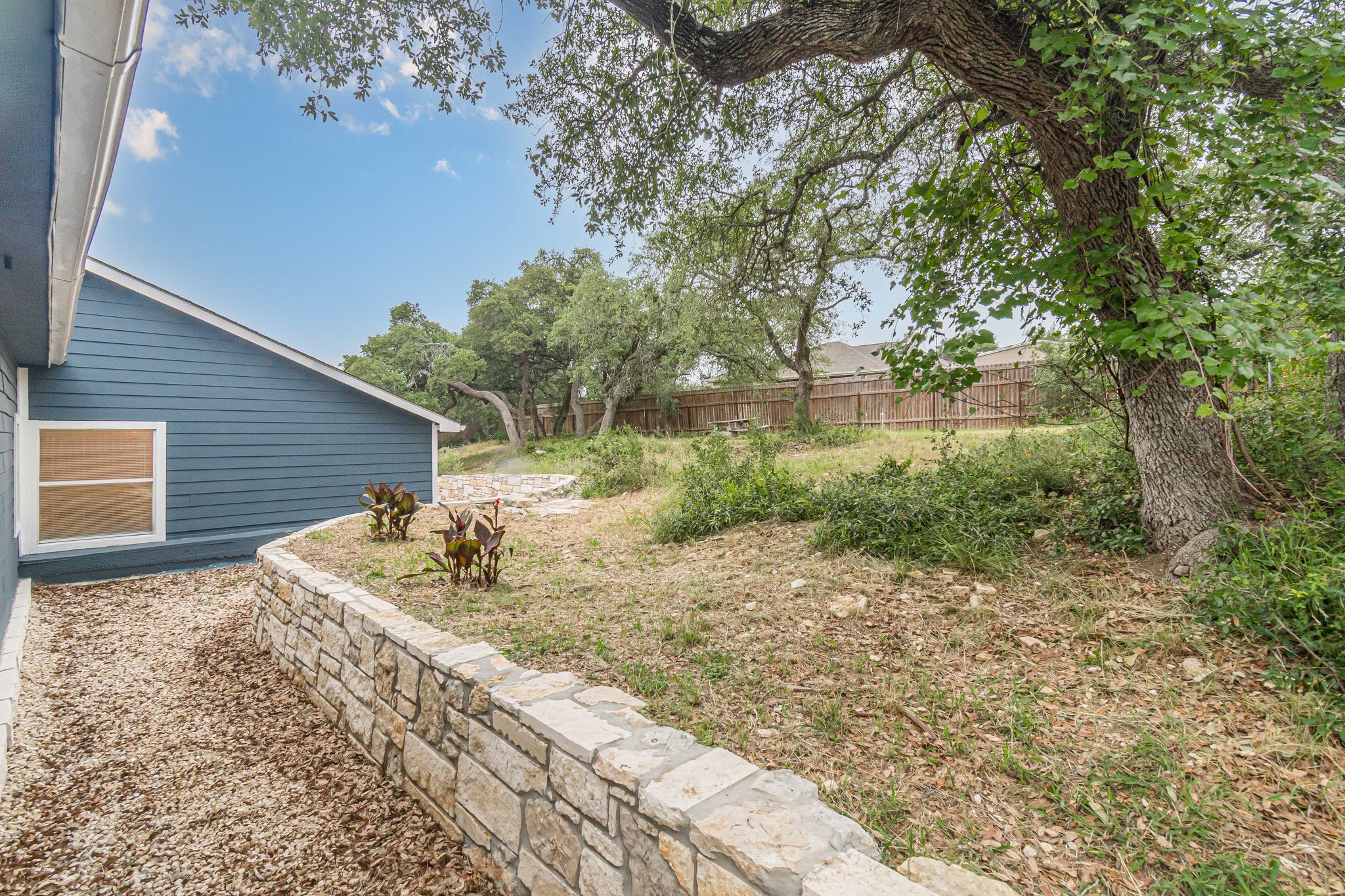 560 Persimmon Pass Fischer, TX 78623 - Photo 25 of 26 a front view of house with yard
