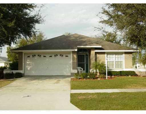 7644 Lewis Road Lakeland, FL 33810 - Photo 1 of 1 a view of a house with backyard and porch