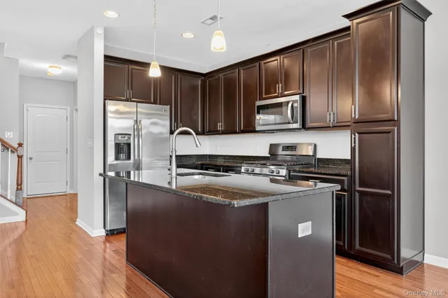 a balcony with a bench in front of it