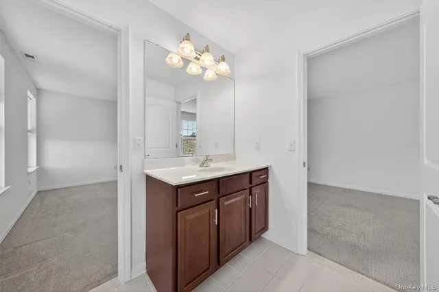 a bathroom with a toilet and a bathtub
