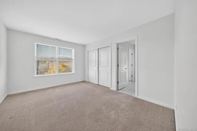 a bathroom with a sink vanity and a mirror