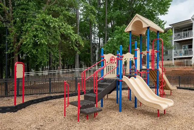 a view of outdoor space with seating and trees