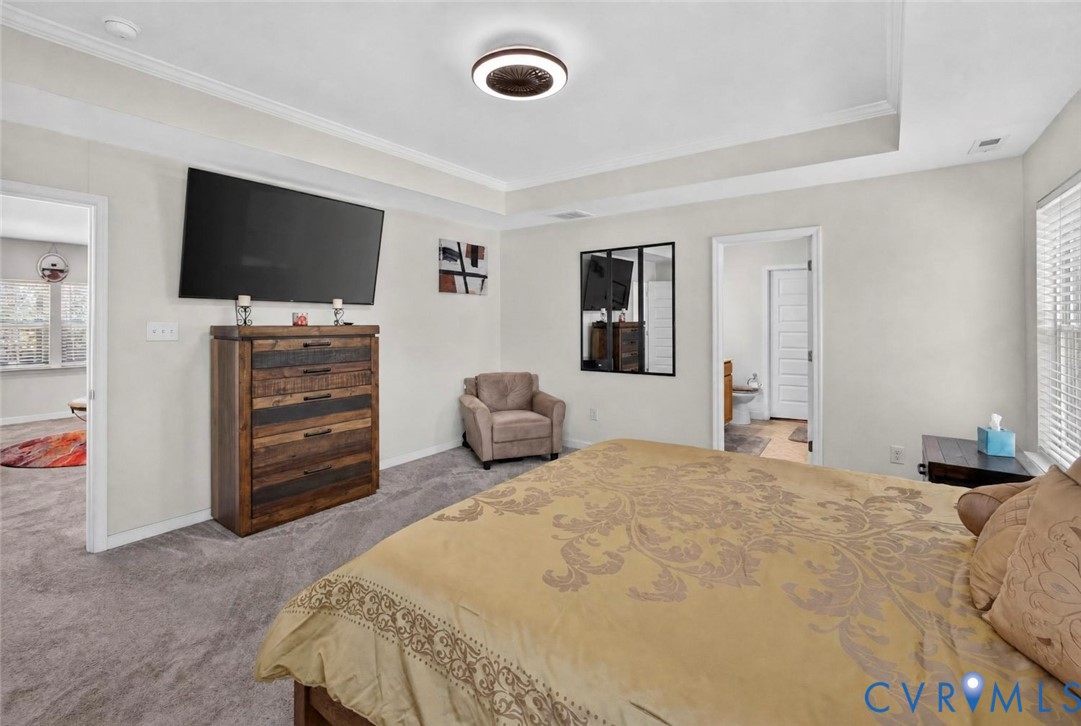 7507 Rouseaux Circle Chesterfield, VA 23832 - Photo 21 of 37 Tray ceiling with recessed lighting and a ceiling