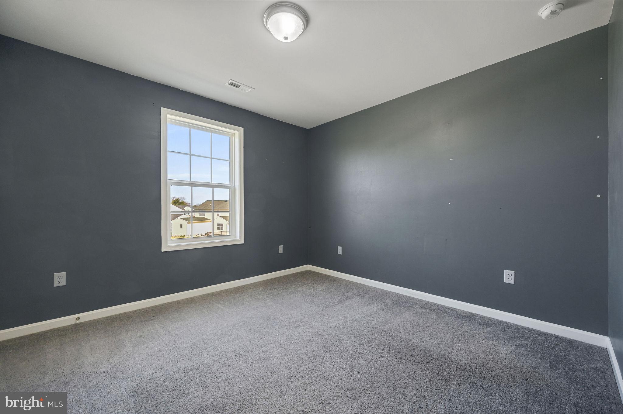 57 Sisal Way Magnolia, DE 19962 - Photo 23 of 30 an empty room with windows