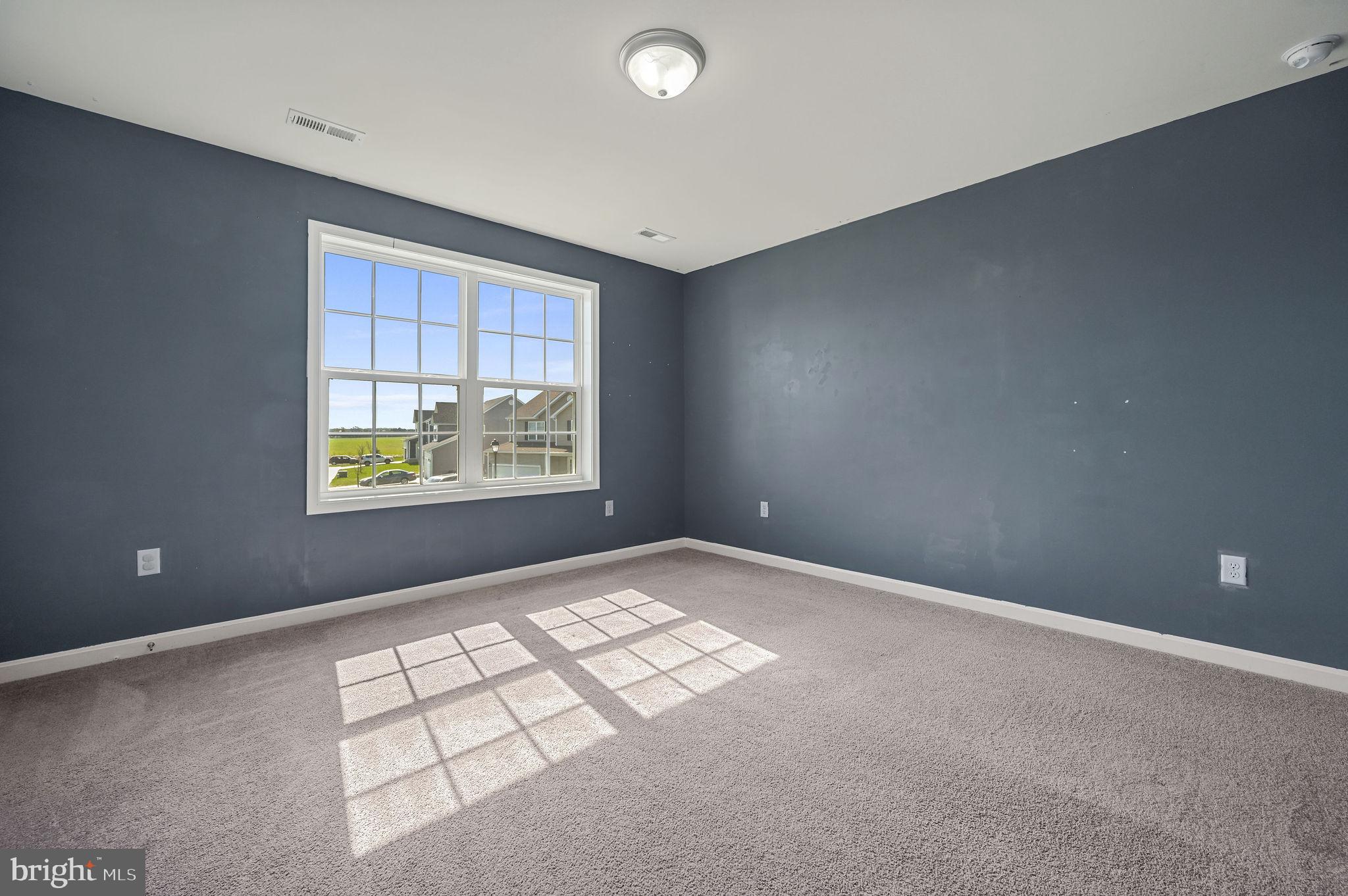 57 Sisal Way Magnolia, DE 19962 - Photo 25 of 30 an empty room with windows