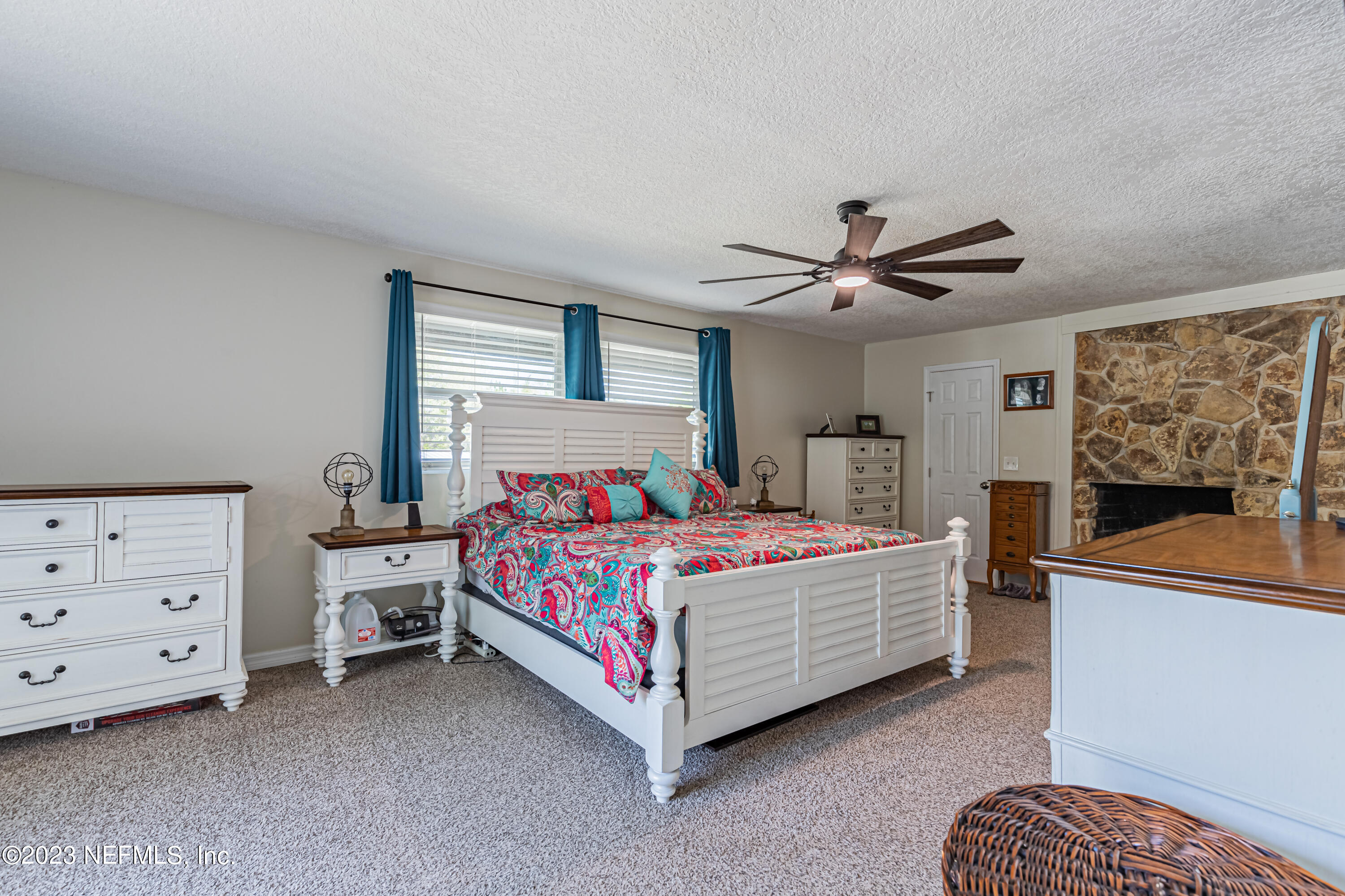2036 Cornell Road Middleburg, FL 32068 - Photo 28 of 62 a bedroom with a bed and a dresser