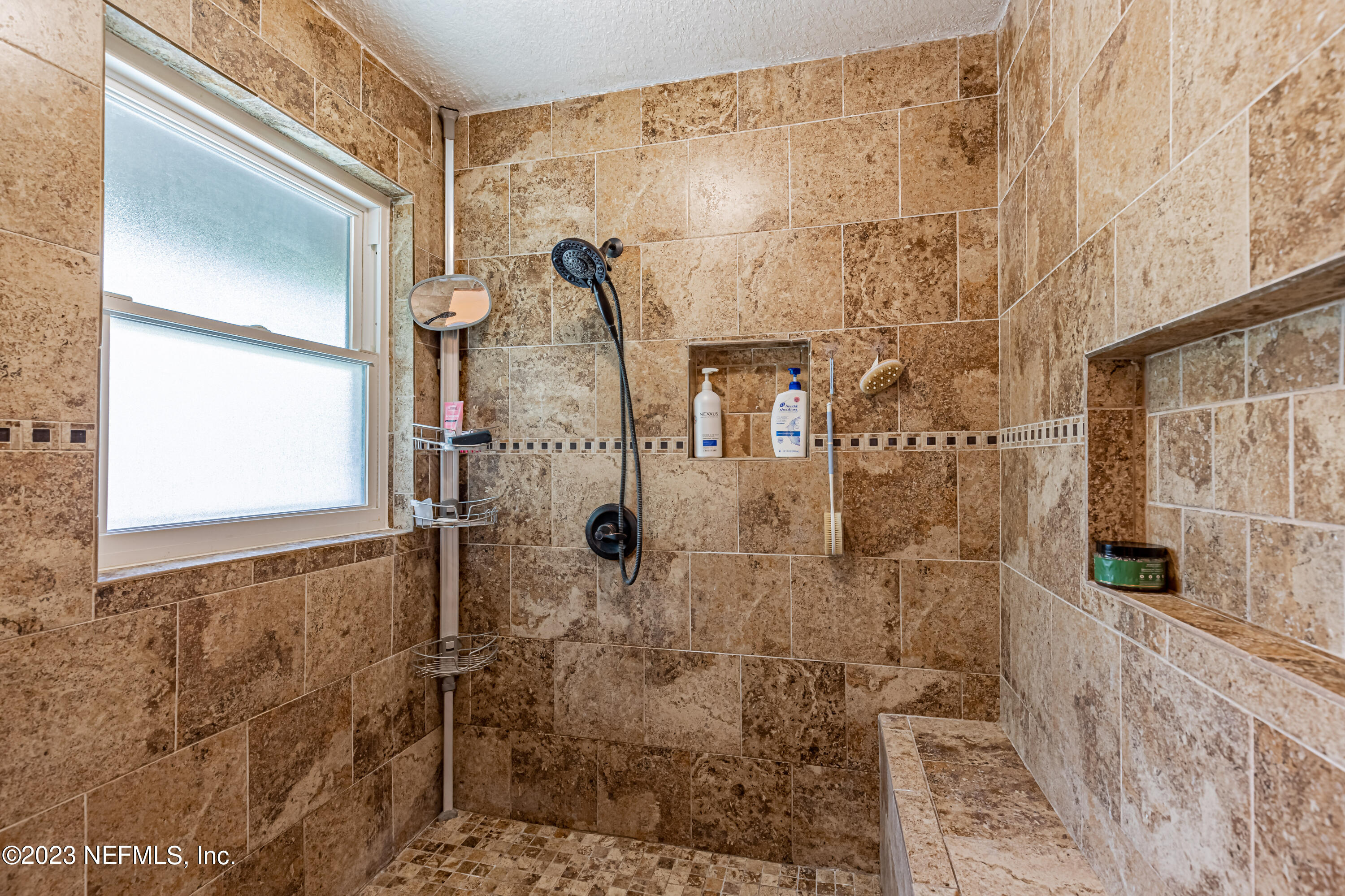 2036 Cornell Road Middleburg, FL 32068 - Photo 31 of 62 a bathroom with a shower