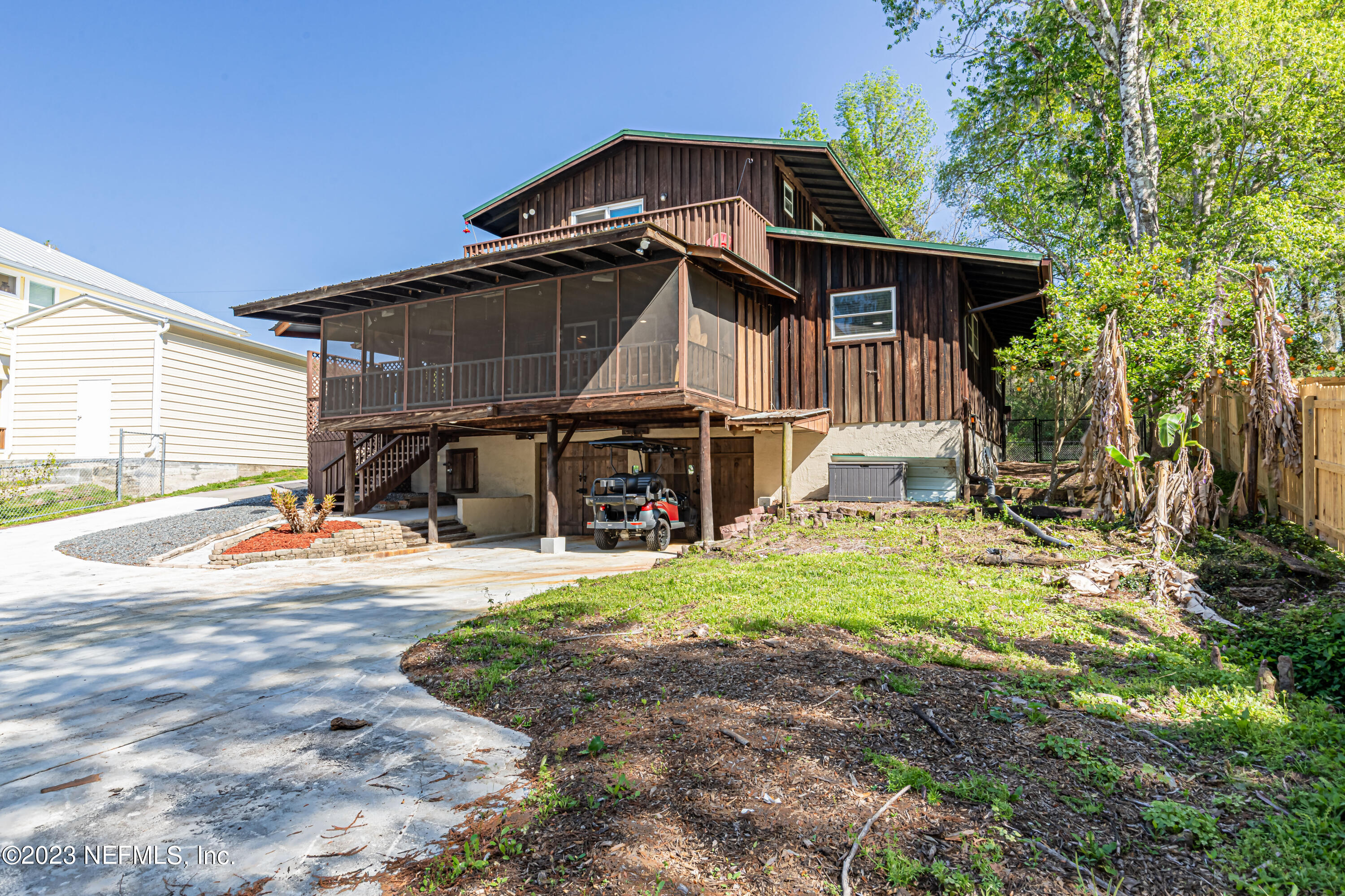 2036 Cornell Road Middleburg, FL 32068 - Photo 44 of 62 a front view of a house with a yard
