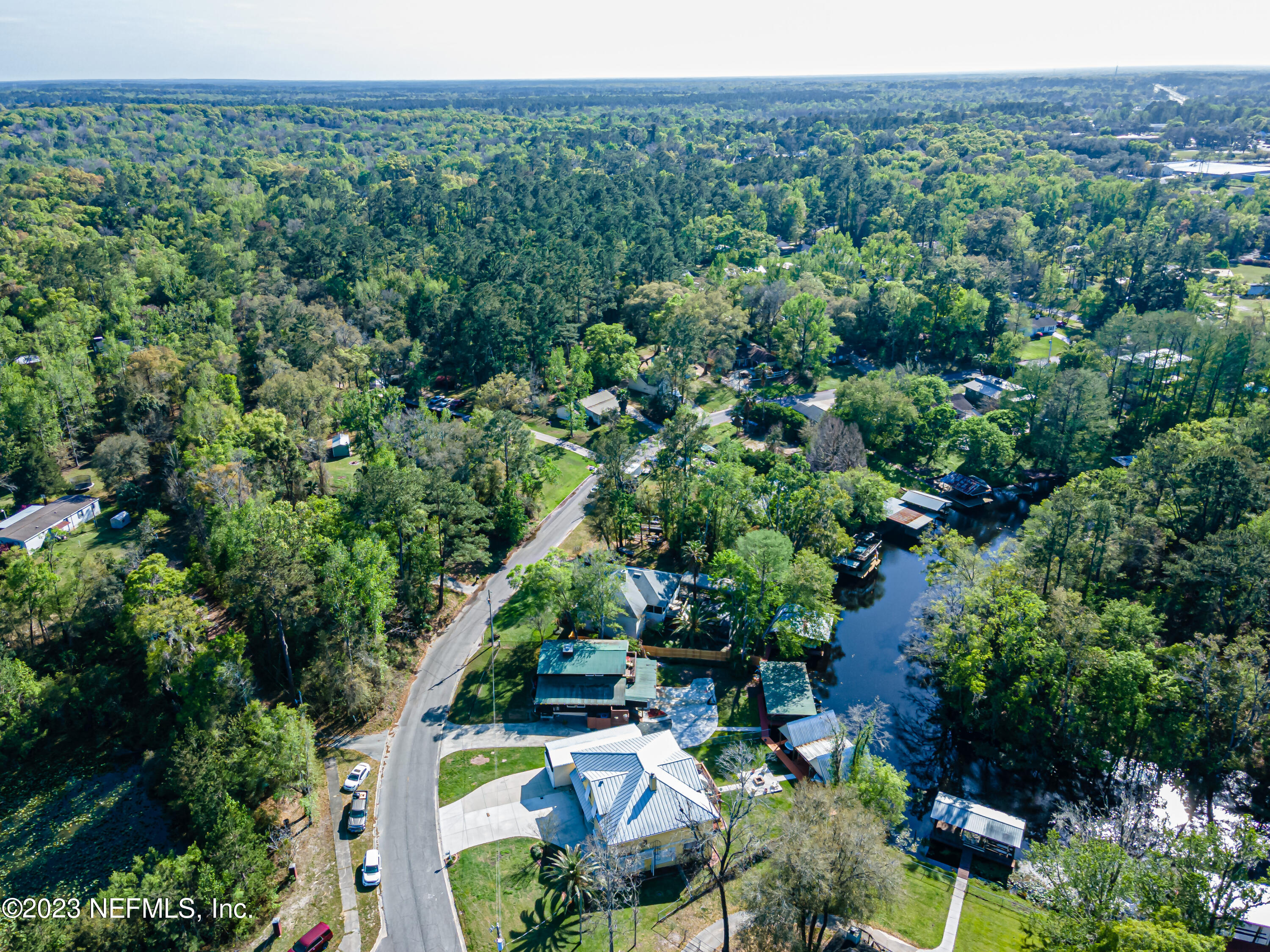 2036 Cornell Road Middleburg, FL 32068 - Photo 60 of 62 an aerial view of a house with a yard