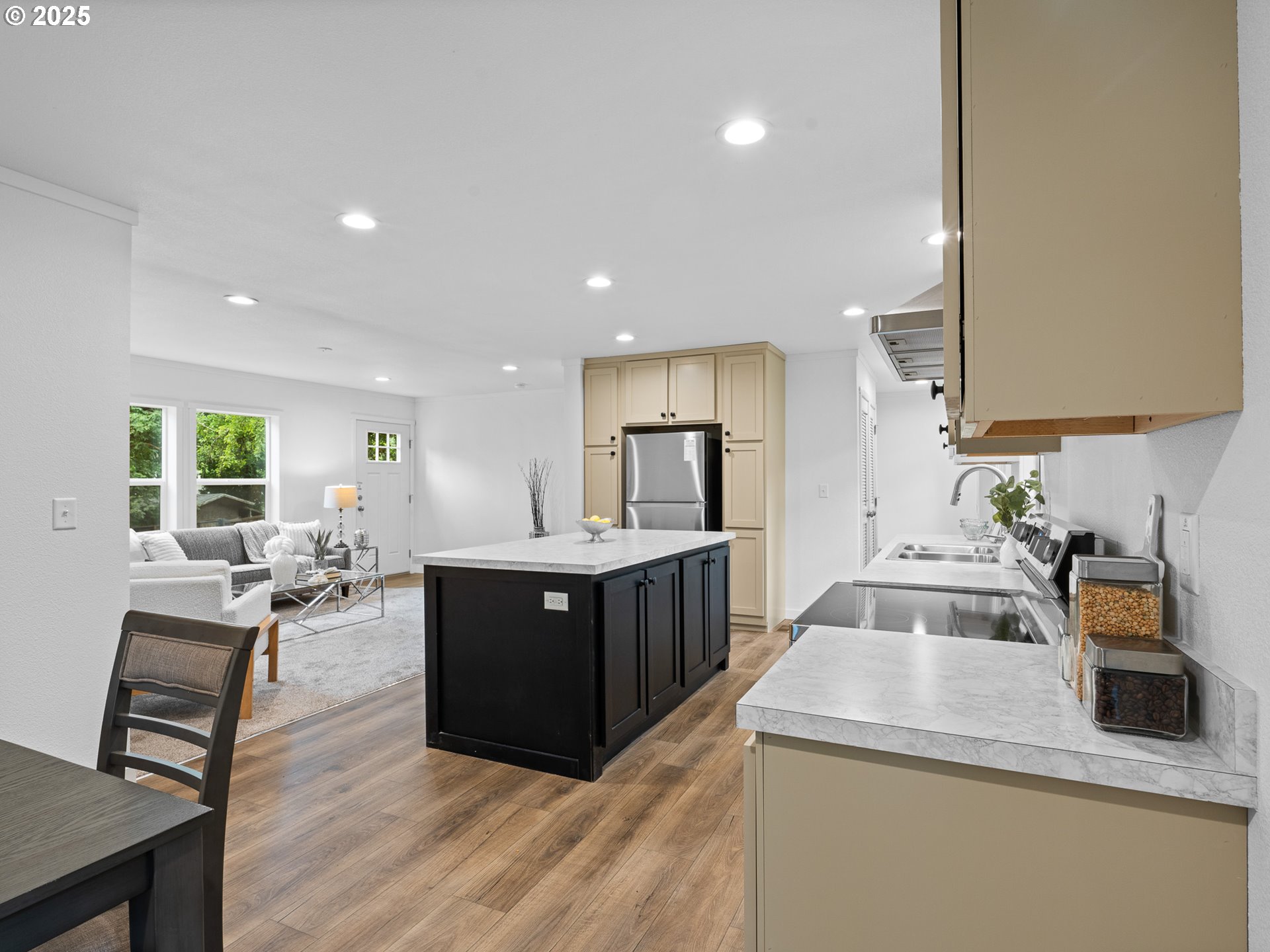 54839 Southwest South Road Gaston, OR 97119 - Photo 15 of 15 a kitchen with sink cabinets and wooden floor