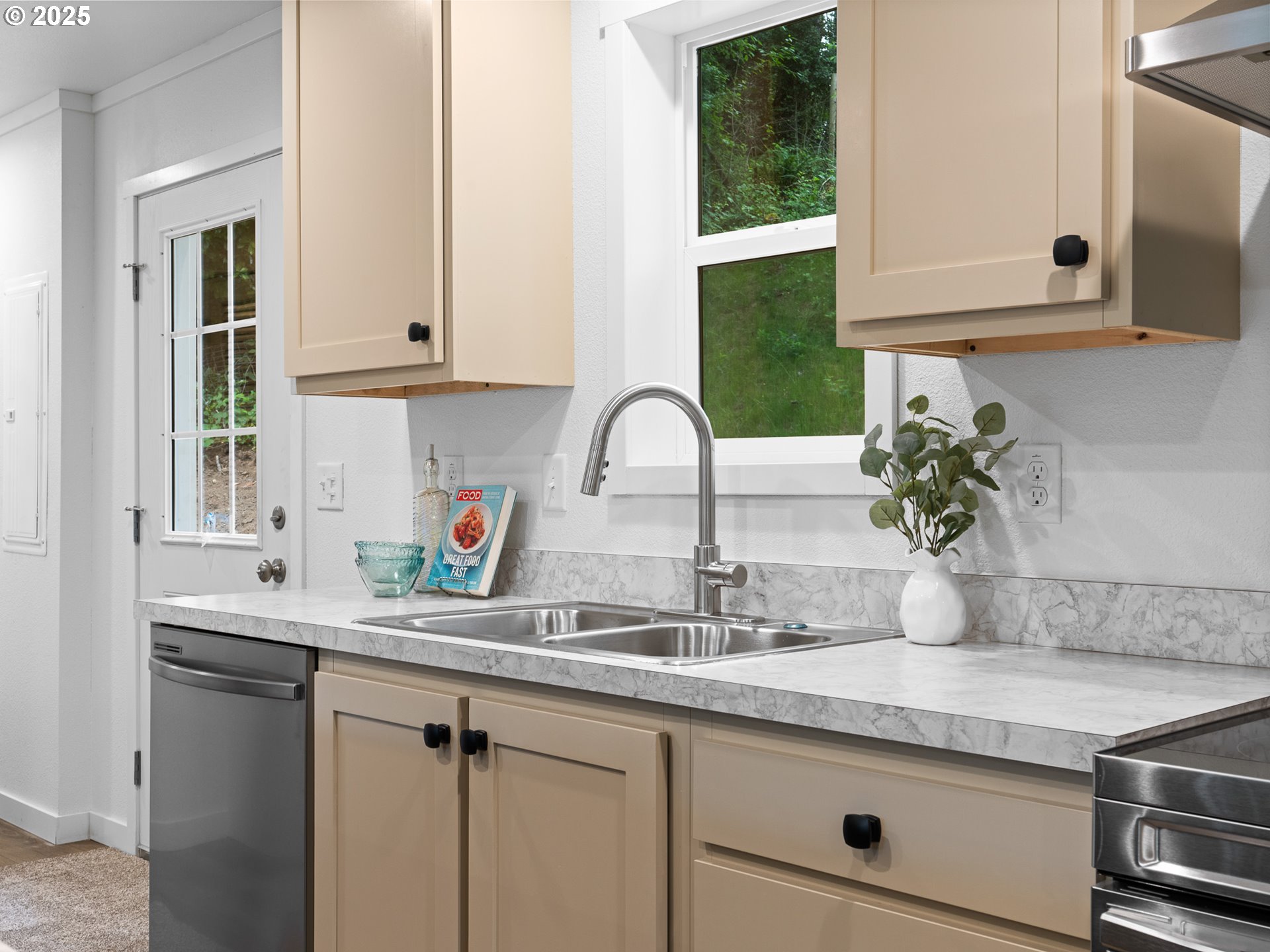 54839 Southwest South Road Gaston, OR 97119 - Photo 5 of 15 a kitchen with granite countertop a sink white cabinets and a window