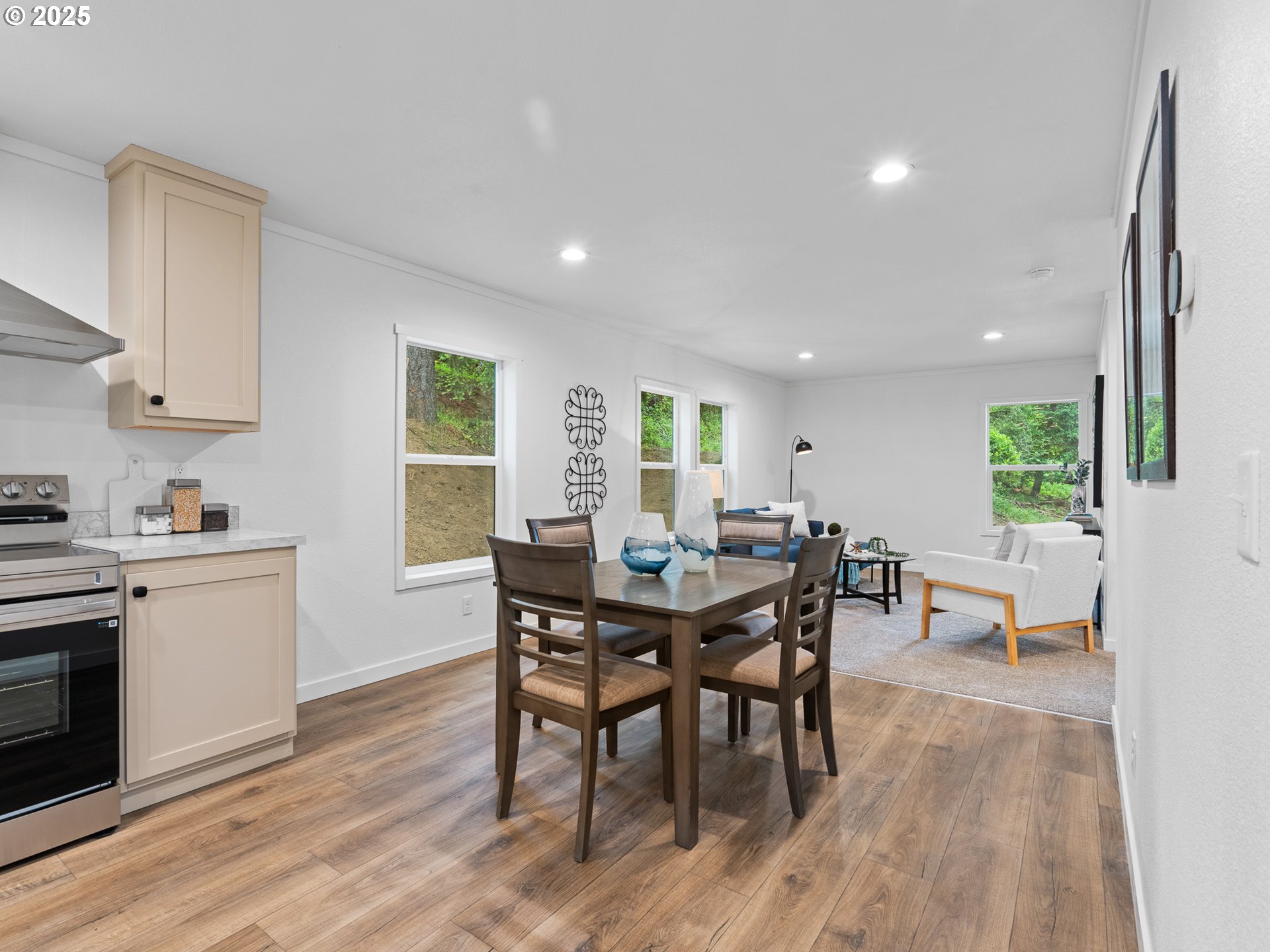 54839 Southwest South Road Gaston, OR 97119 - Photo 6 of 15 a view of a dining room with furniture and wooden floor