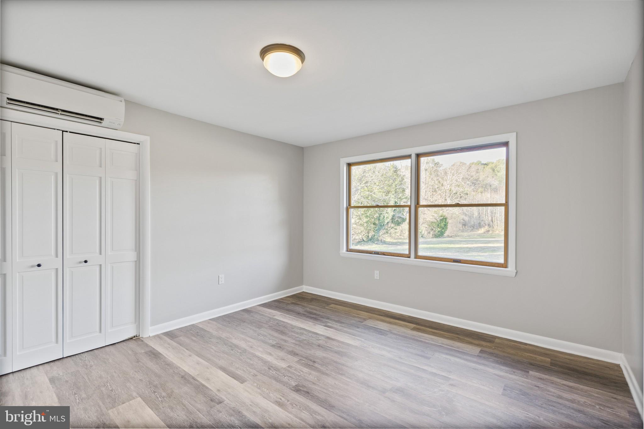 49636 Will's Road Dameron, MD 20628 - Photo 28 of 39 Bedroom with laminate flooring
