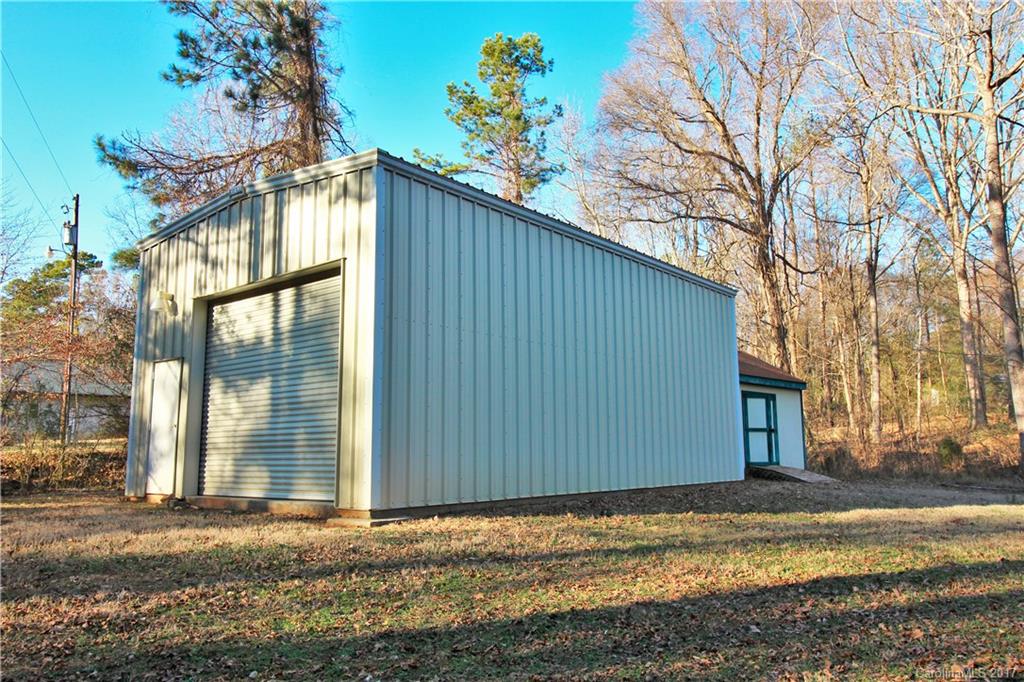 734 Farley Road Fort Mill, SC 29715 - Photo 19 of 23 a view of a house with a yard