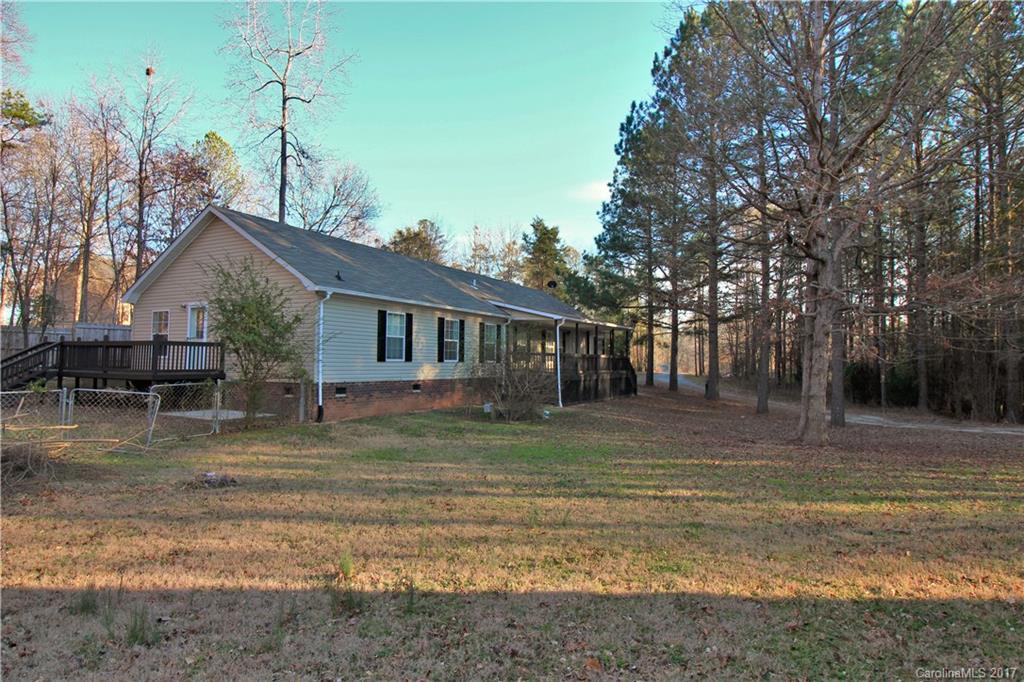 734 Farley Road Fort Mill, SC 29715 - Photo 4 of 23 a view of a house with a yard