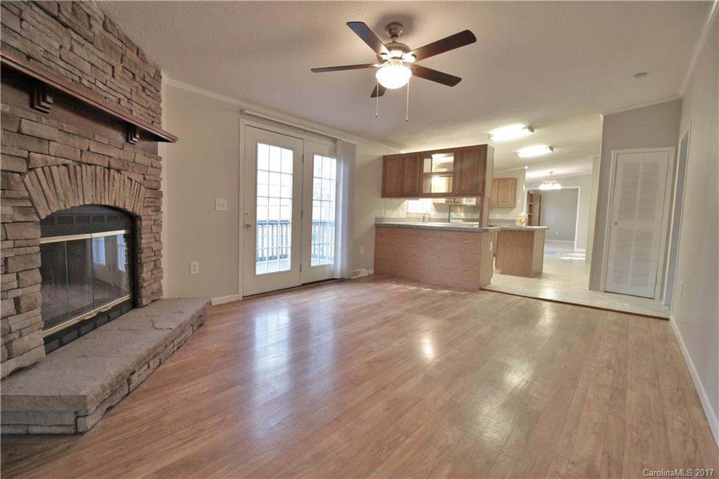 734 Farley Road Fort Mill, SC 29715 - Photo 6 of 23 a view of a kitchen with a sink cabinets and a fireplace