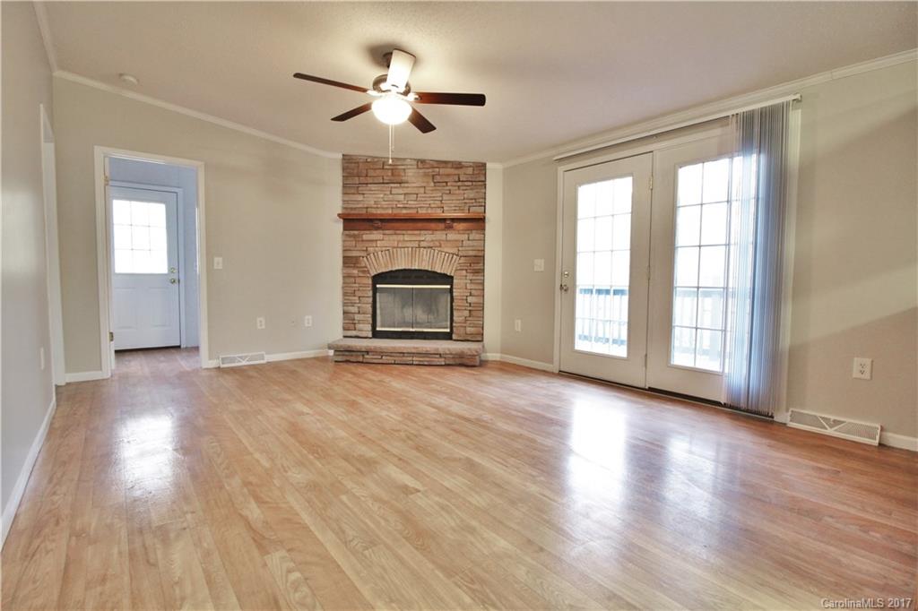 734 Farley Road Fort Mill, SC 29715 - Photo 7 of 23 a view of empty room with wooden floor and fan