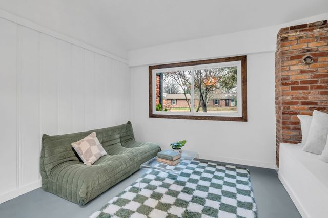a living room with furniture and a couch