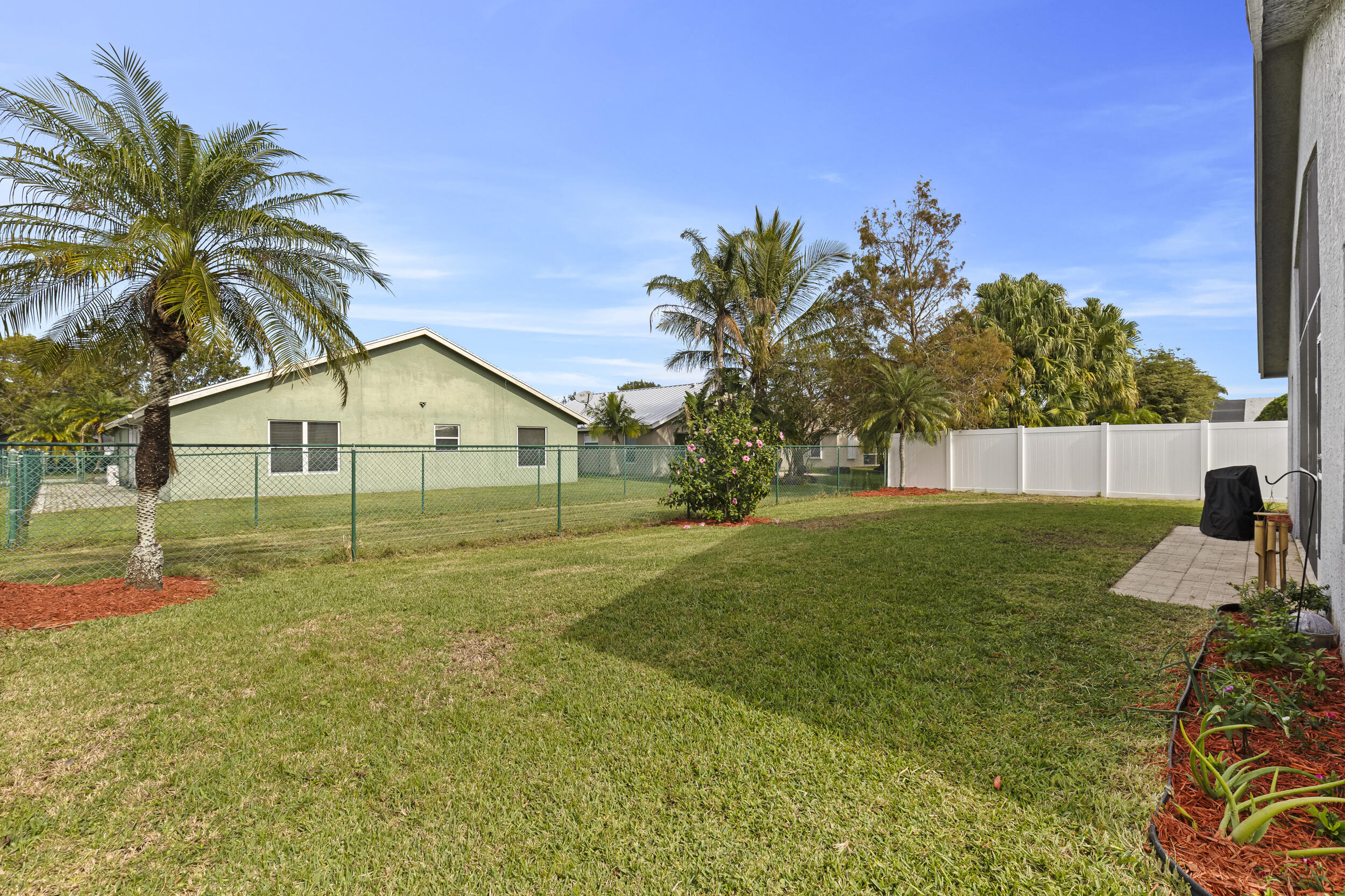 2829 Southwest Montego Terrace Stuart, FL 34997 - Photo 19 of 21 Fully Fenced Back Yard
