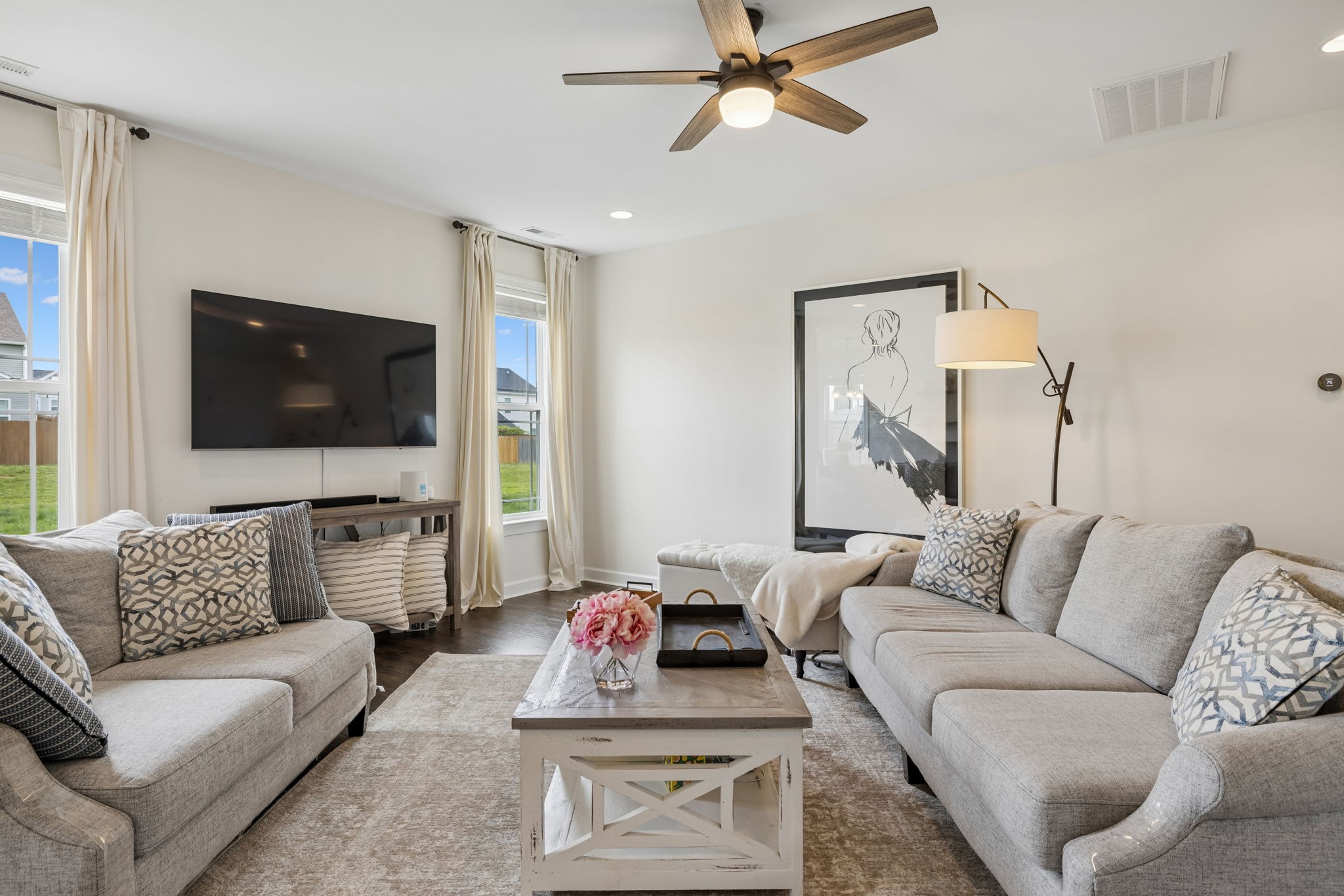 1002 Garrison Way Spring Hill, TN 37174 - Photo 16 of 63 a living room with furniture and a flat screen tv