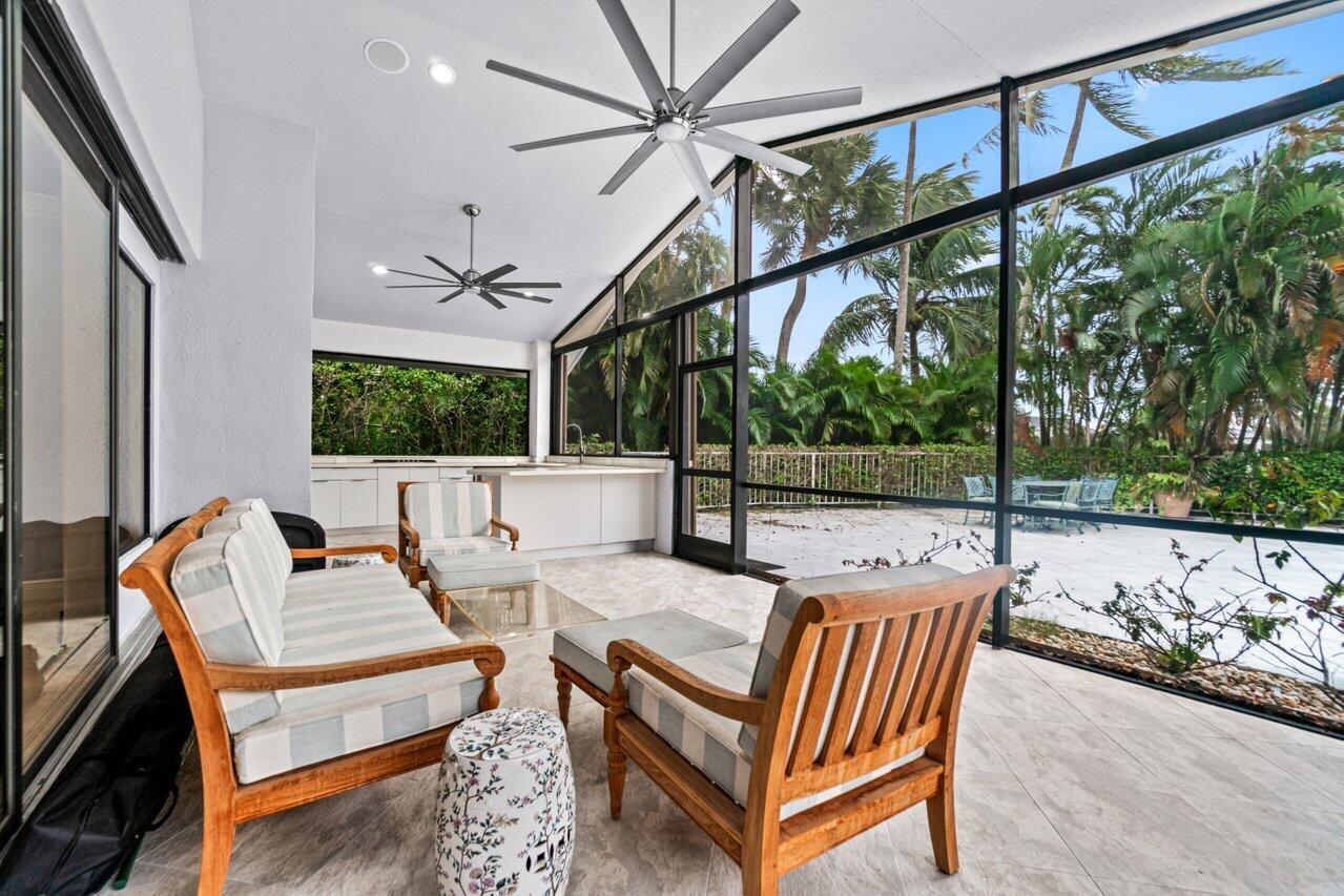 4335 Bocaire Boulevard Boca Raton, FL 33487 - Photo 16 of 55 a outdoor living space with furniture and garden view