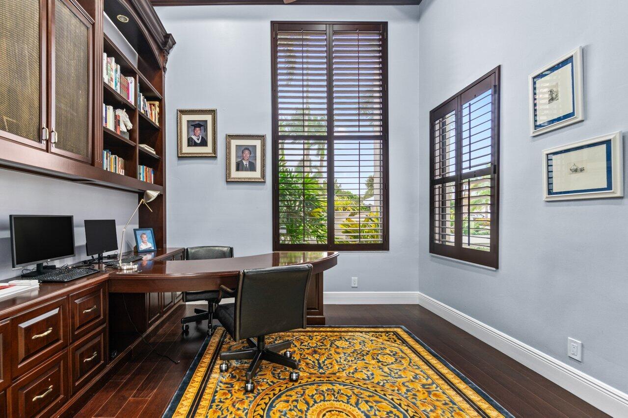 4335 Bocaire Boulevard Boca Raton, FL 33487 - Photo 31 of 55 a view of a workspace with furniture and a window