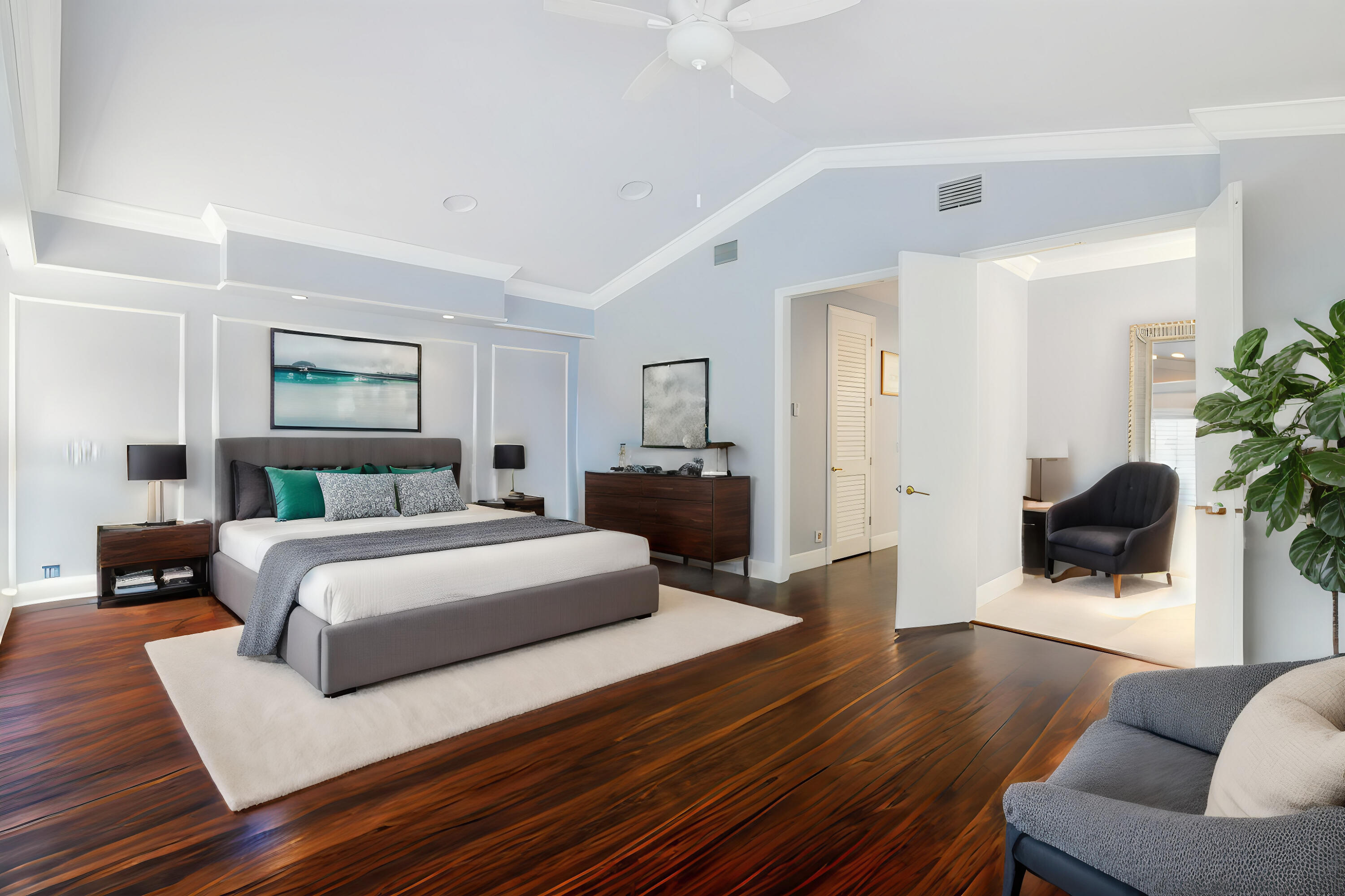 4335 Bocaire Boulevard Boca Raton, FL 33487 - Photo 32 of 55 a bedroom with a large bed and a couch