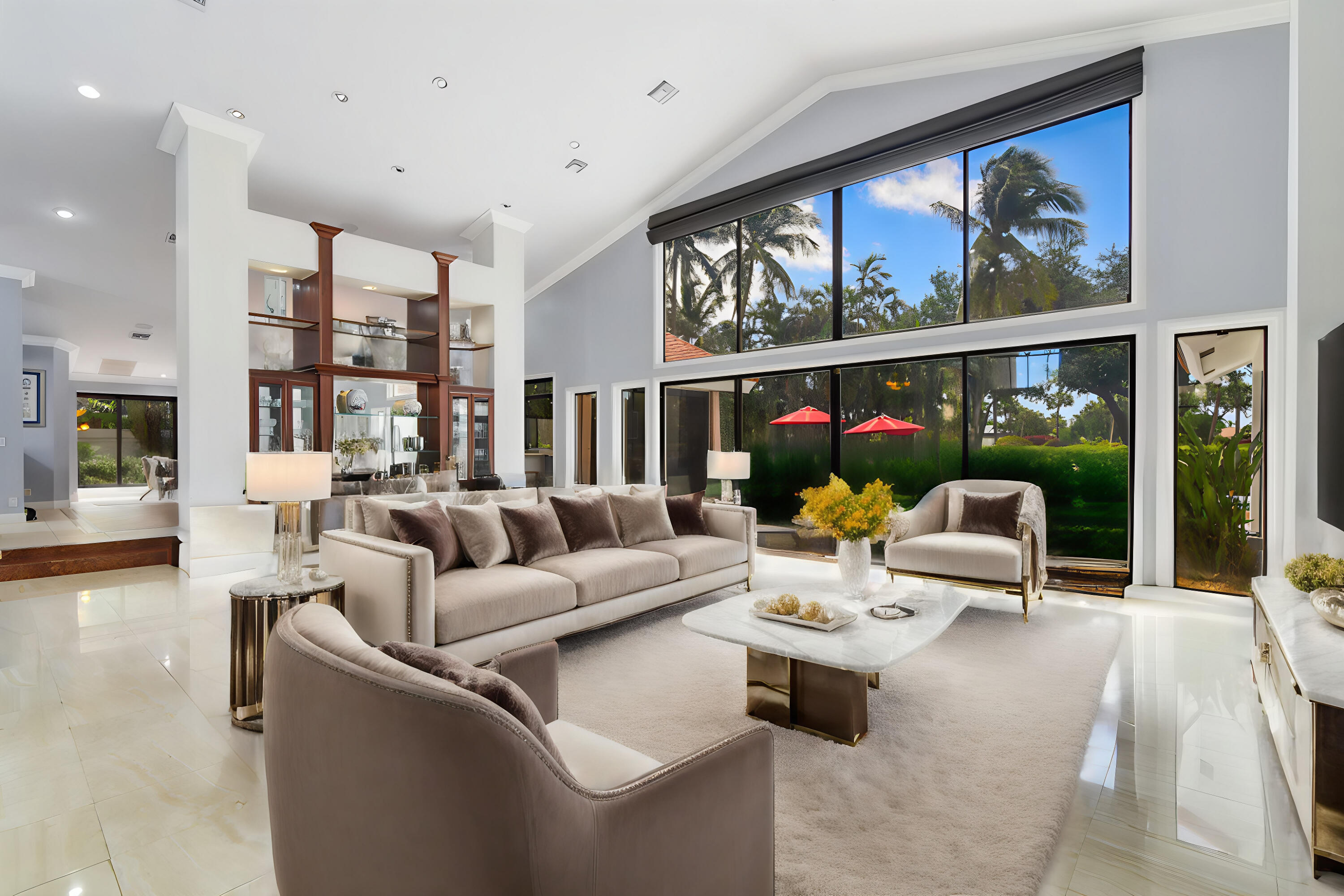 4335 Bocaire Boulevard Boca Raton, FL 33487 - Photo 8 of 55 a living room with furniture and a large window