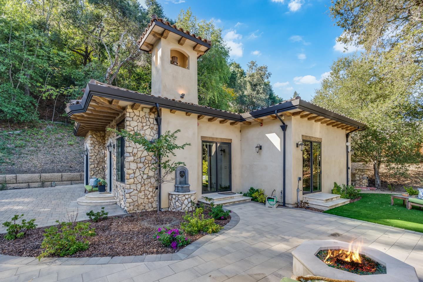 13740 Pierce Road Saratoga, CA 95070 - Photo 3 of 100 a front view of a house with garden