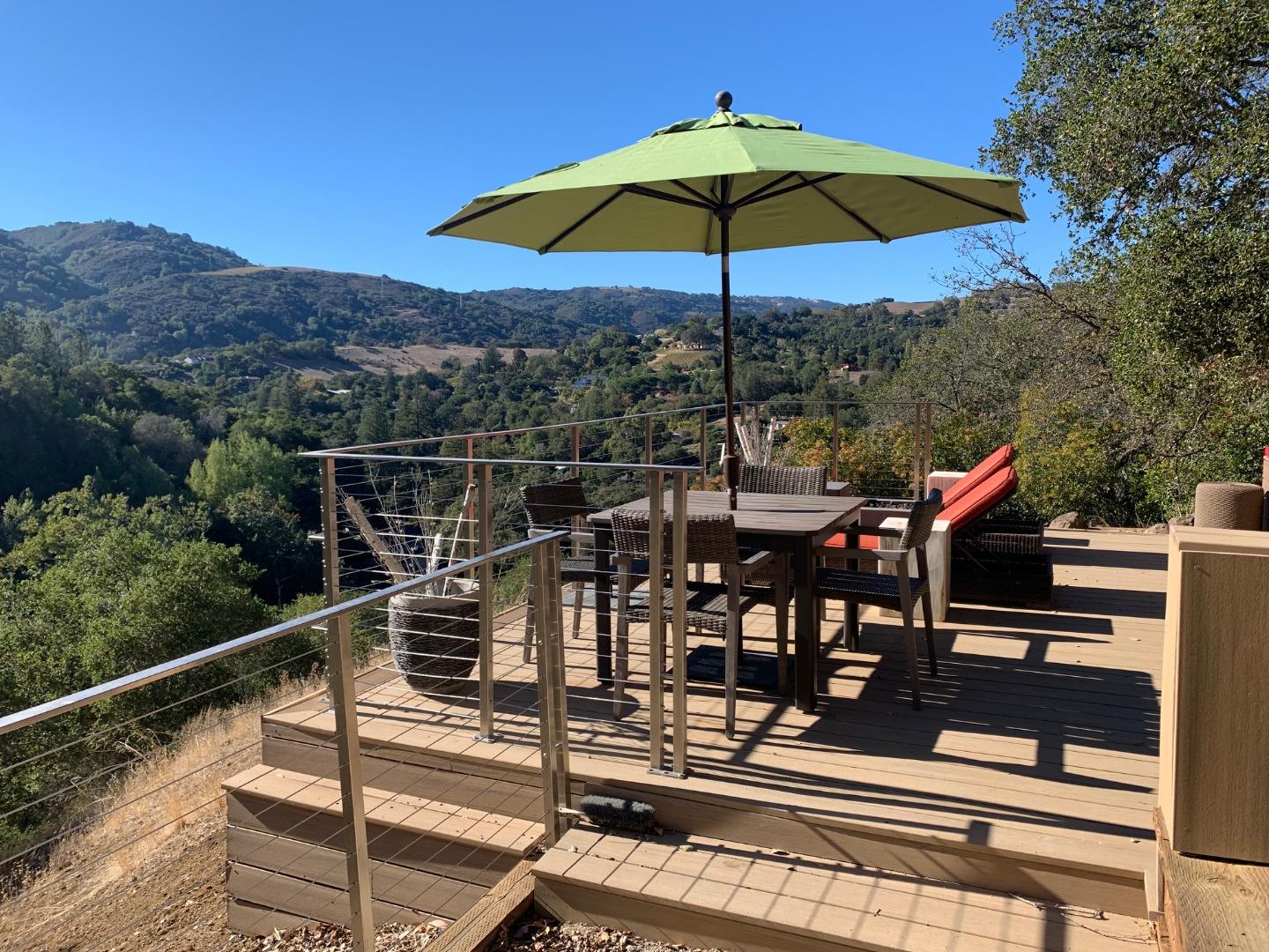13740 Pierce Road Saratoga, CA 95070 - Photo 53 of 100 a view of a terrace with furniture and umbrella