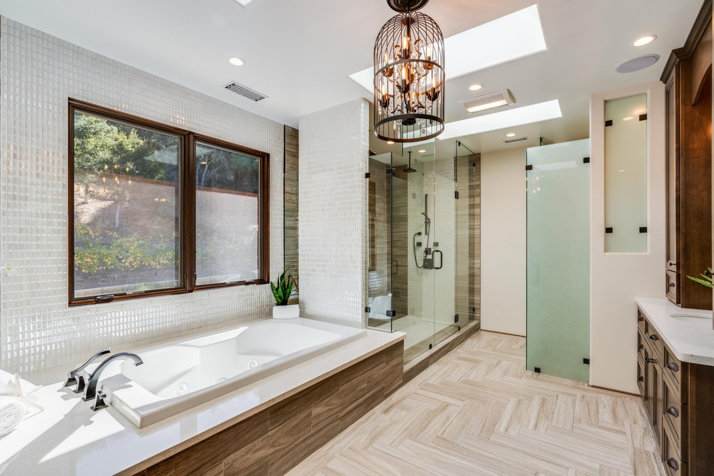 13740 Pierce Road Saratoga, CA 95070 - Photo 83 of 100 a spacious bathroom with a double vanity sink a large mirror and a shower