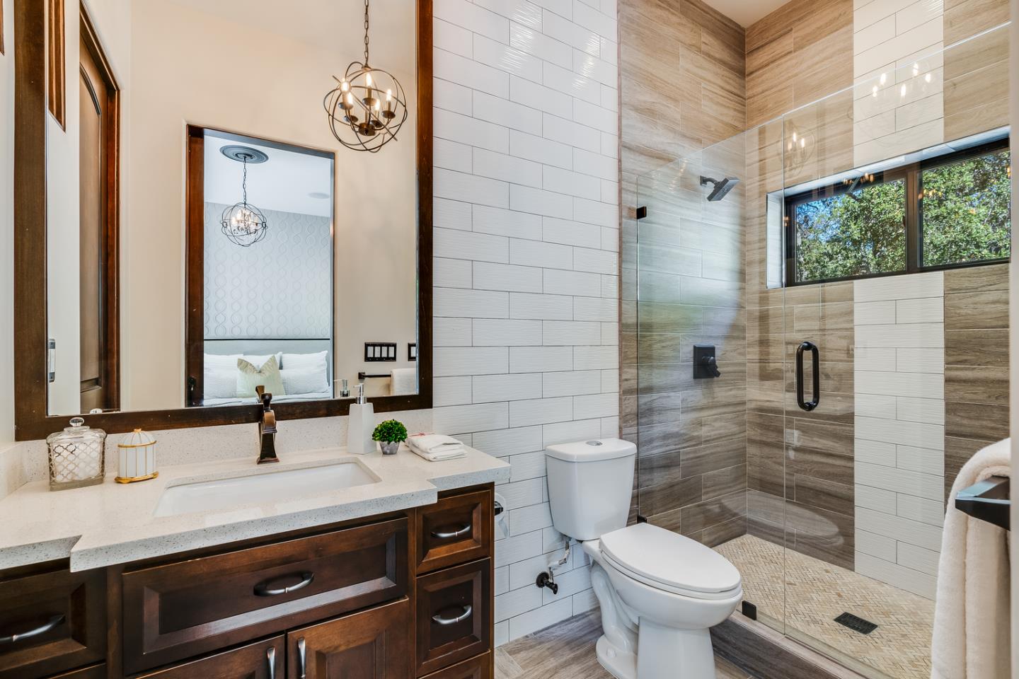 13740 Pierce Road Saratoga, CA 95070 - Photo 92 of 100 a bathroom with a granite countertop sink toilet and shower