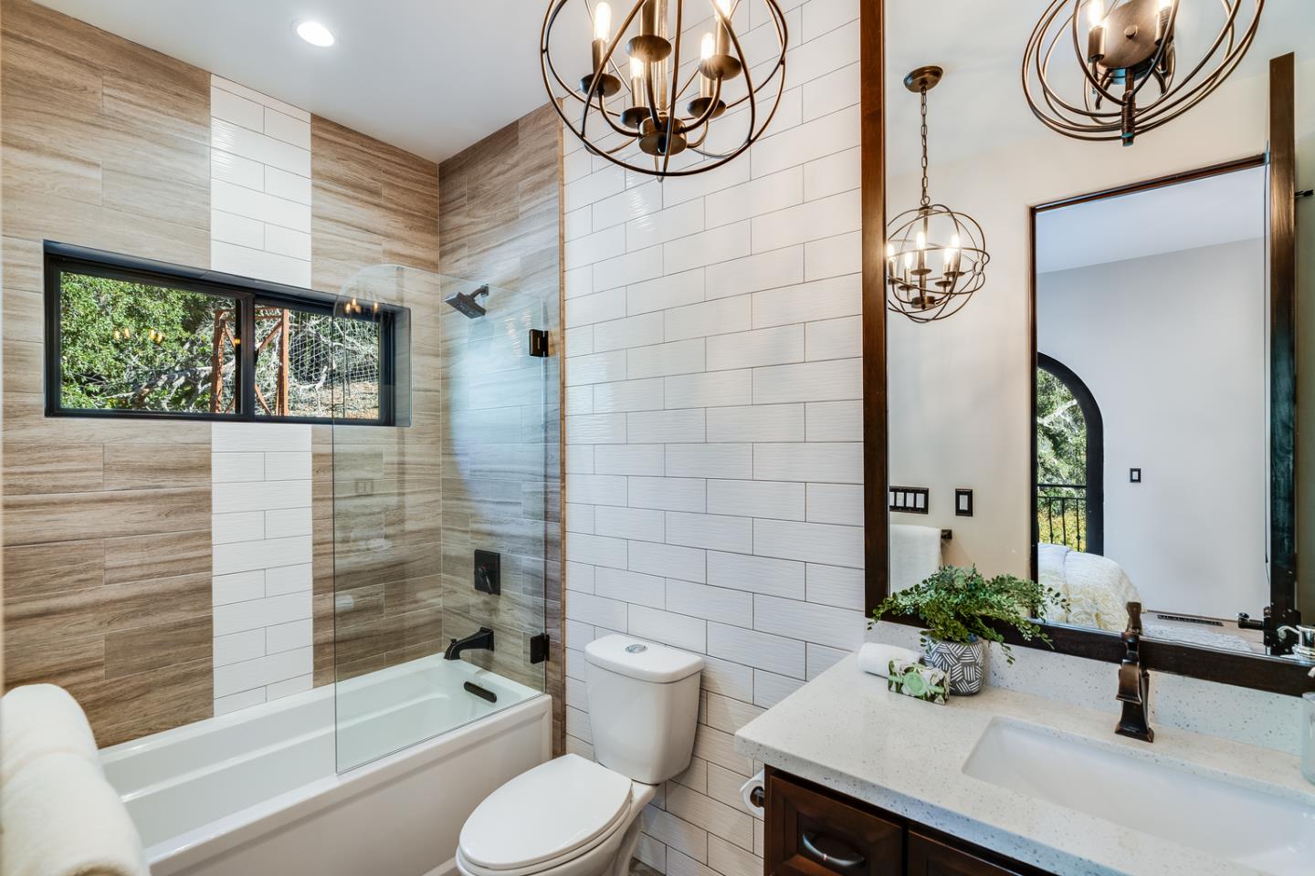 13740 Pierce Road Saratoga, CA 95070 - Photo 96 of 100 a bathroom with a sink a toilet and shower