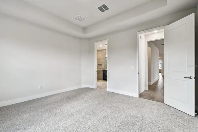 a bathroom with a sink a mirror and a shower
