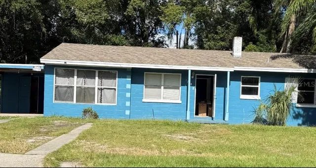 a house view with a garden space