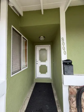 a front view of a house with a garage