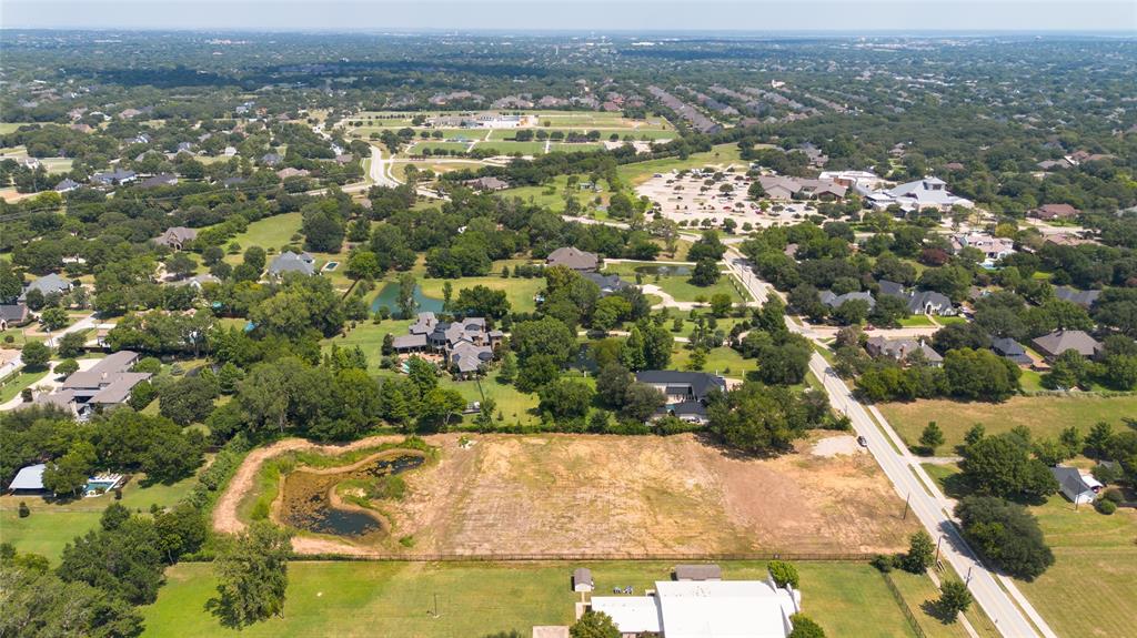 6200 Pleasant Run Road Colleyville, TX 76034 - Photo 5 of 10 an aerial view of residential houses with outdoor space