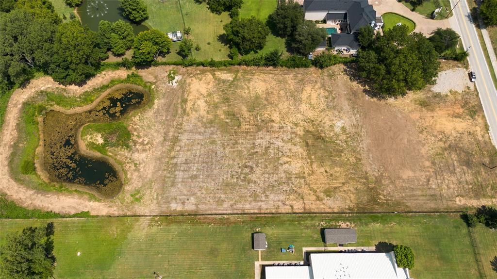 6200 Pleasant Run Road Colleyville, TX 76034 - Photo 8 of 10 an aerial view of a houses with ocean view