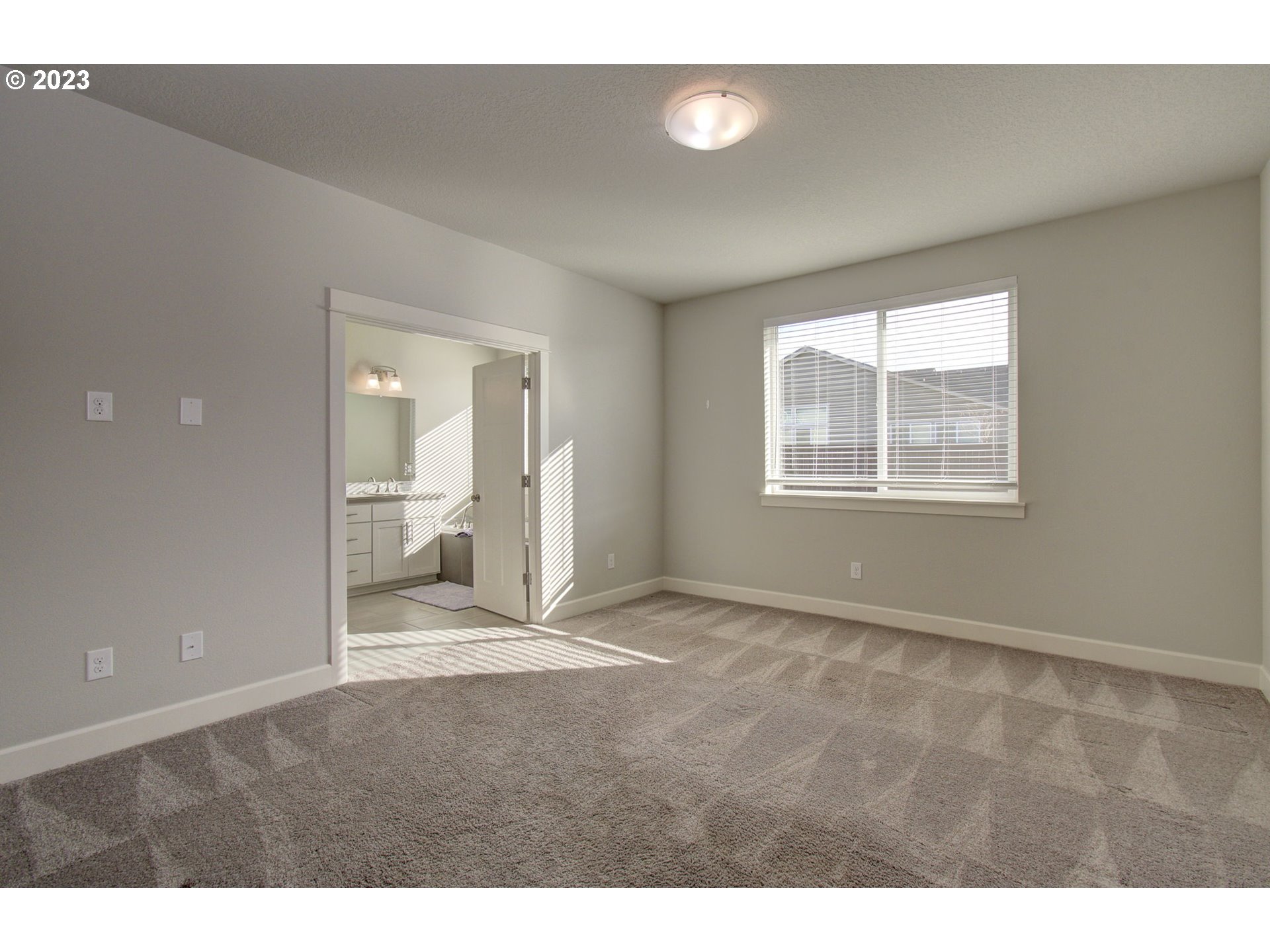 4823 South 16th Drive Ridgefield, WA 98642 - Photo 14 of 37 a view of an empty room with a window