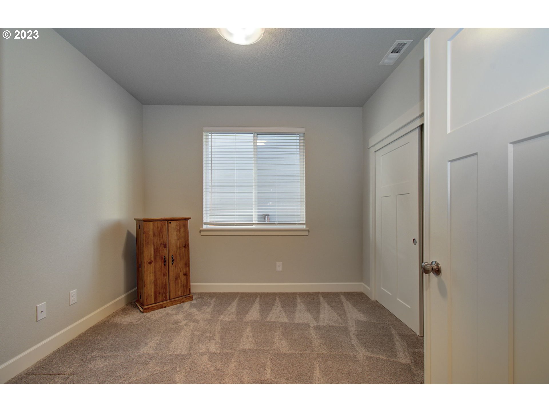 4823 South 16th Drive Ridgefield, WA 98642 - Photo 23 of 37 a view of an empty room with a window