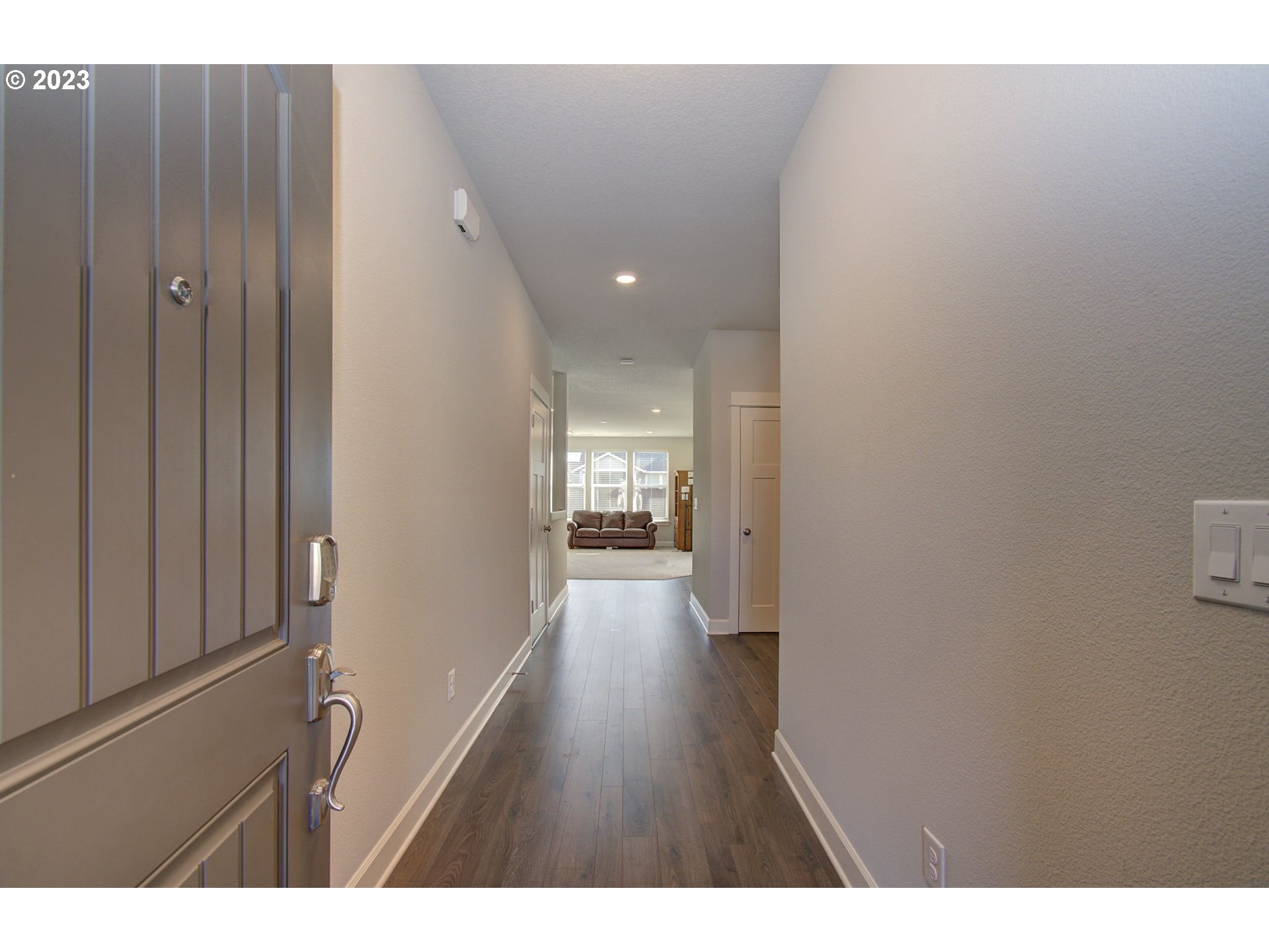4823 South 16th Drive Ridgefield, WA 98642 - Photo 3 of 37 a view of hallway with wooden floor