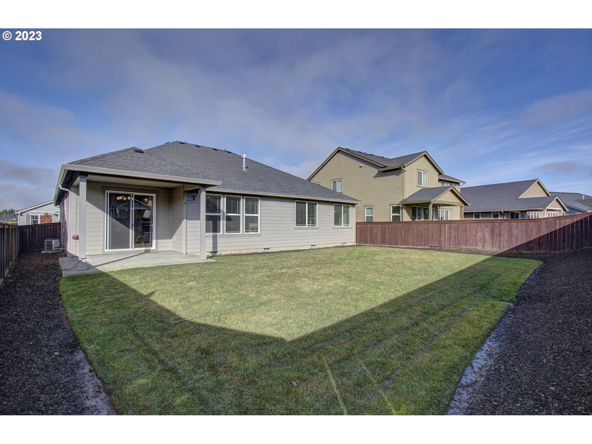 4823 South 16th Drive Ridgefield, WA 98642 - Photo 32 of 37 a front view of a house with a garden