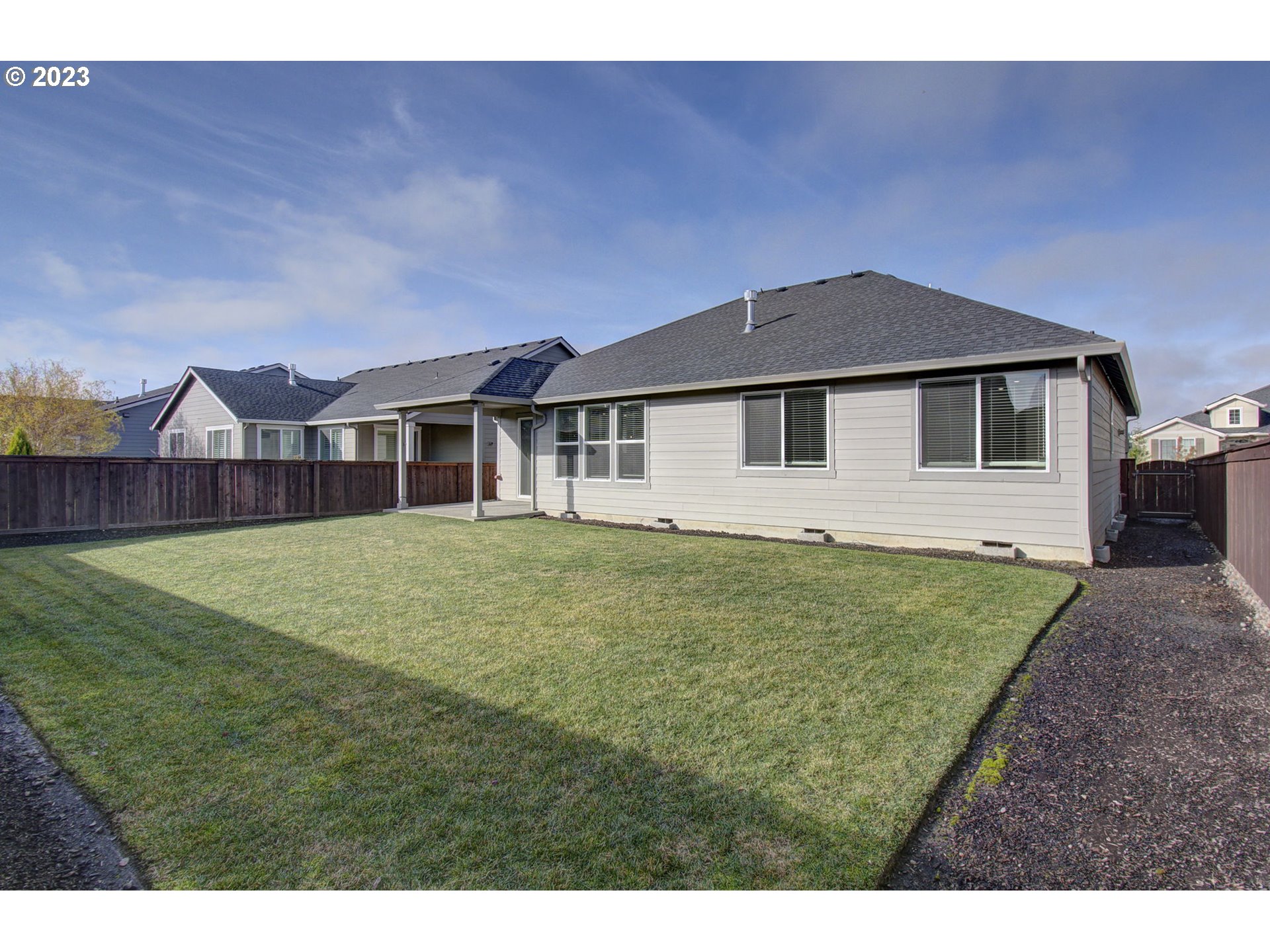 4823 South 16th Drive Ridgefield, WA 98642 - Photo 33 of 37 a view of an house with backyard space and balcony
