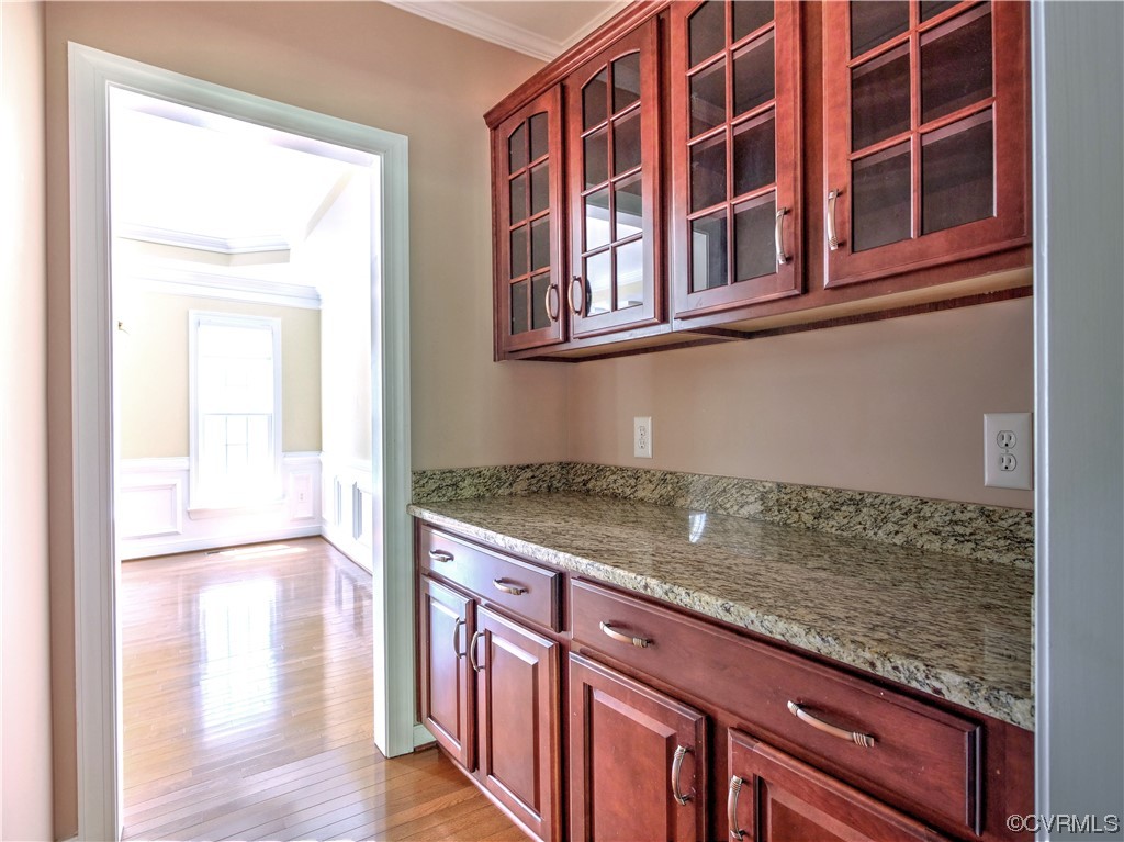 1024 Kingham Drive Midlothian, VA 23114 - Photo 19 of 41 a view of a kitchen cabinets and wooden floor