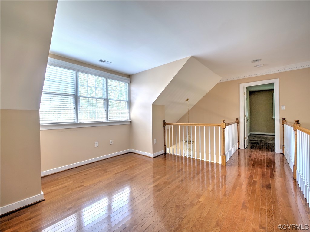1024 Kingham Drive Midlothian, VA 23114 - Photo 25 of 41 wooden floor in an empty room with a window