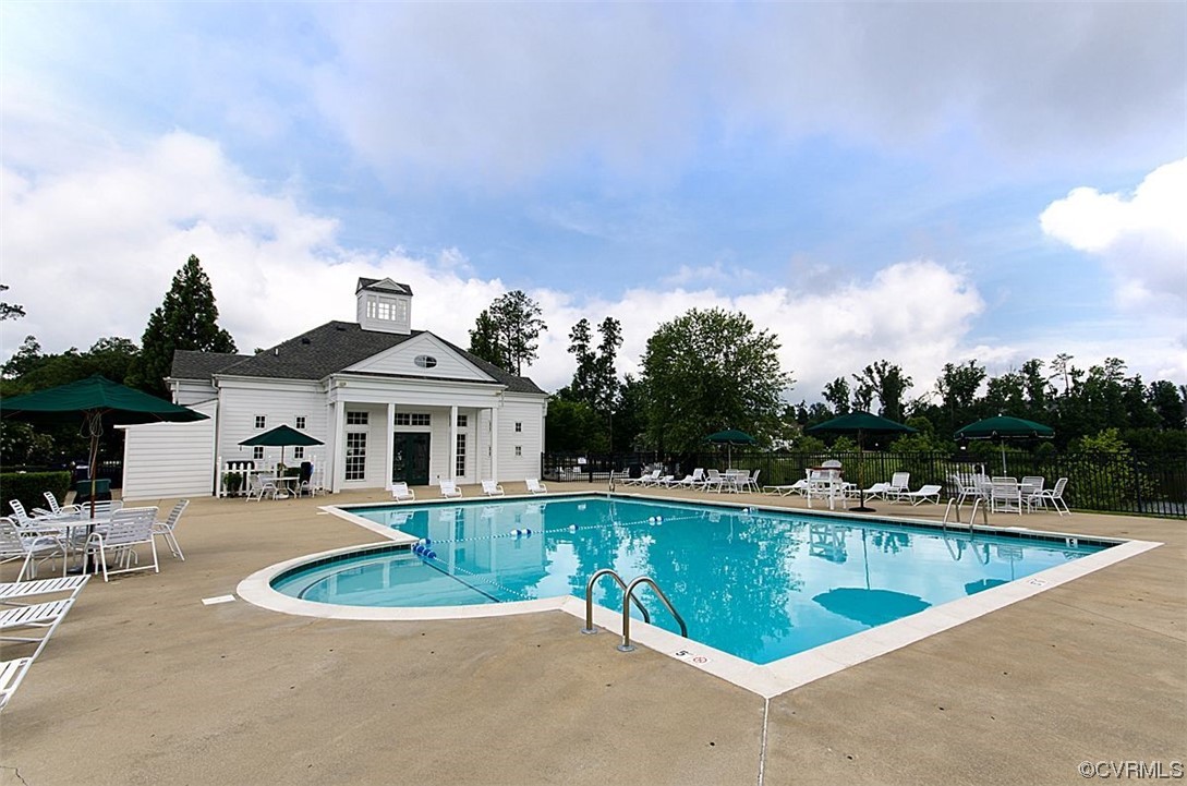 1024 Kingham Drive Midlothian, VA 23114 - Photo 36 of 41 a view of a house with pool and chairs