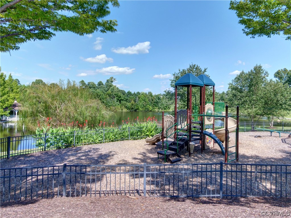 1024 Kingham Drive Midlothian, VA 23114 - Photo 39 of 41 a view of a lake with a patio
