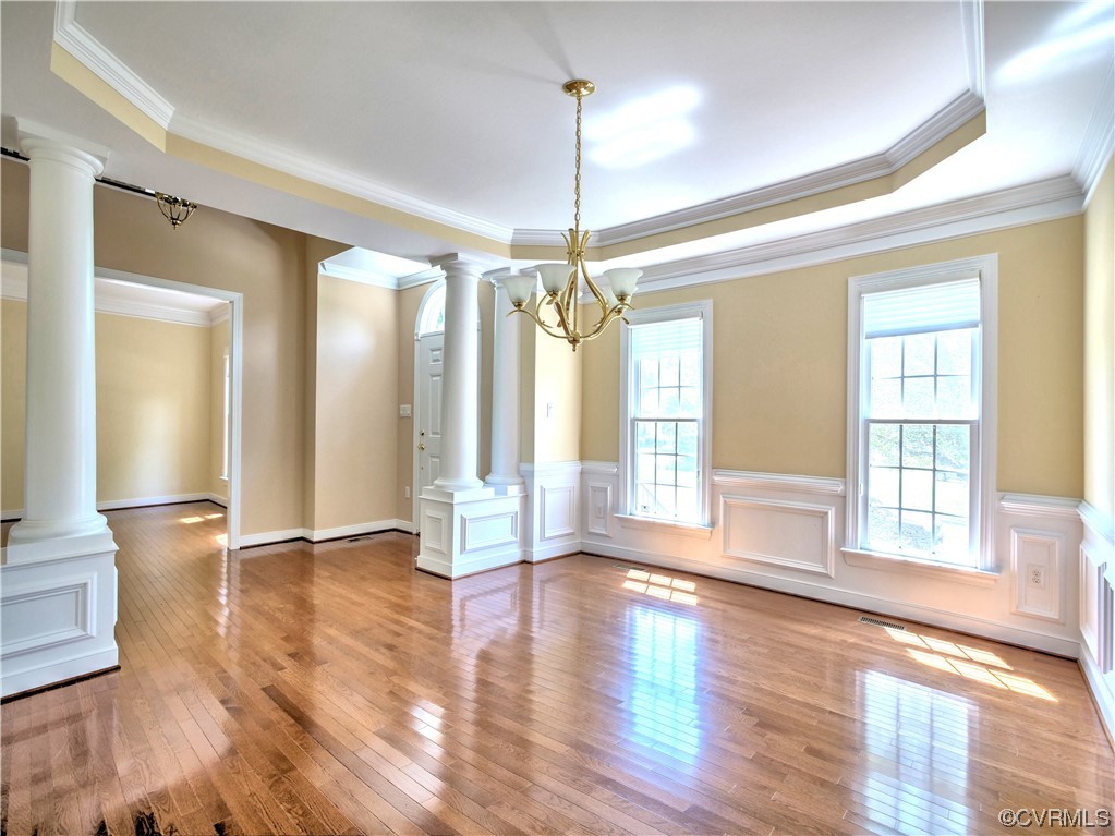 1024 Kingham Drive Midlothian, VA 23114 - Photo 8 of 41 a view of an empty room with wooden floor and a window