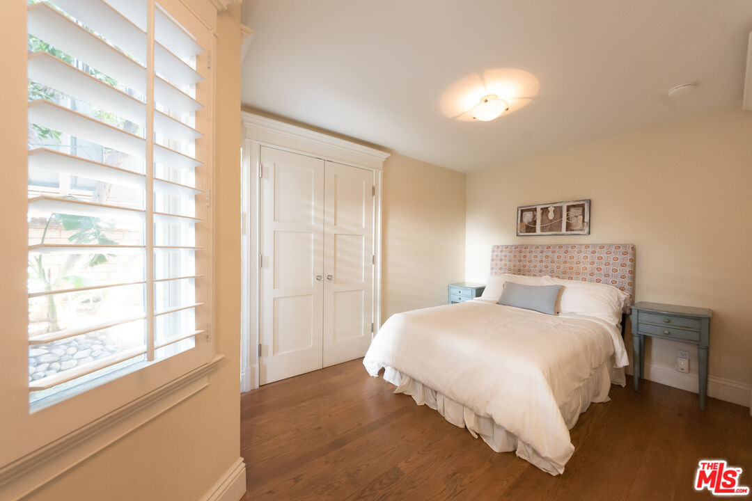 30760 Broad Beach Road Malibu, CA 90265 - Photo 28 of 41 a bedroom with a bed and a window